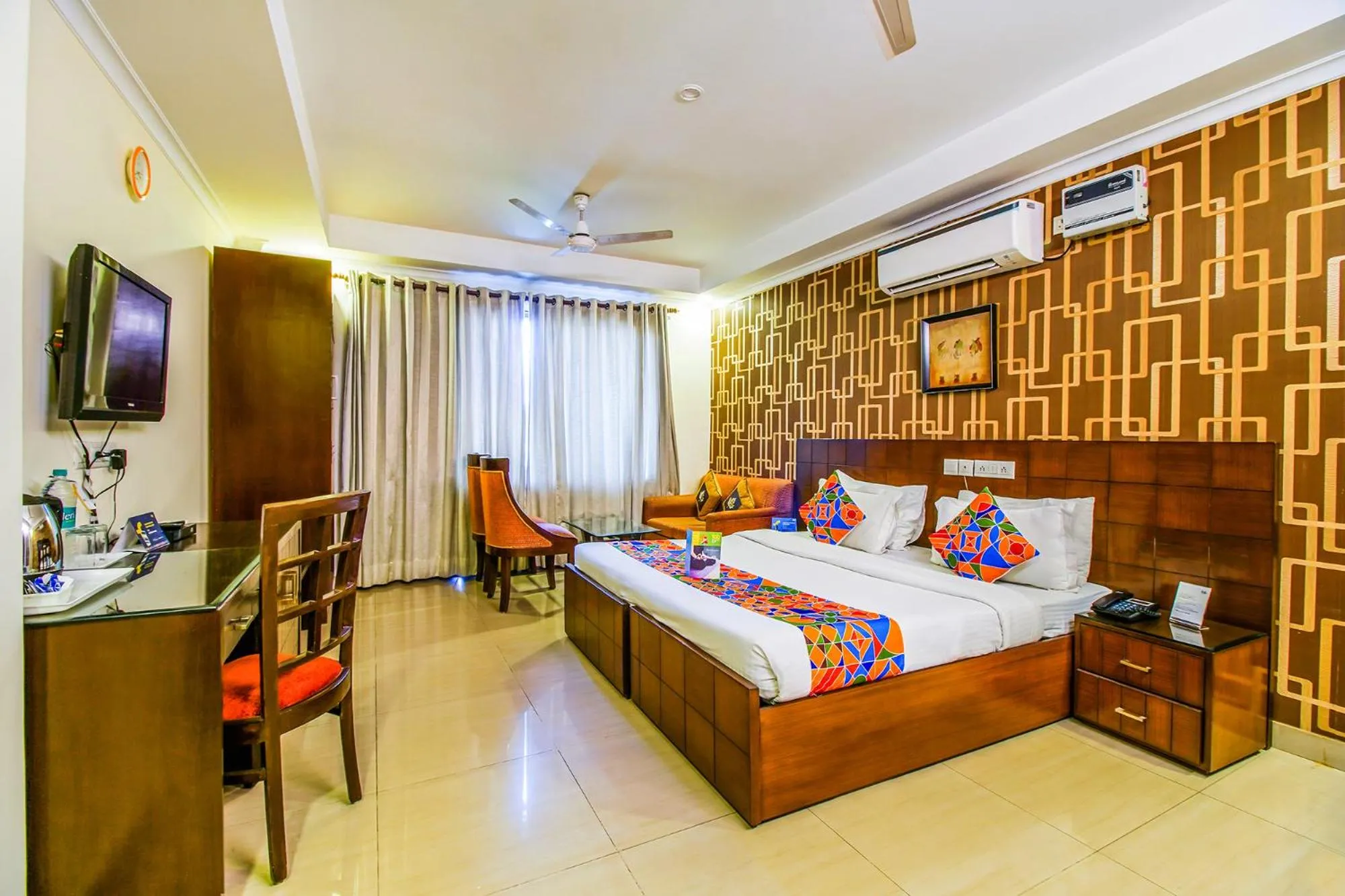 Bed in FabHotel Signature Plaza