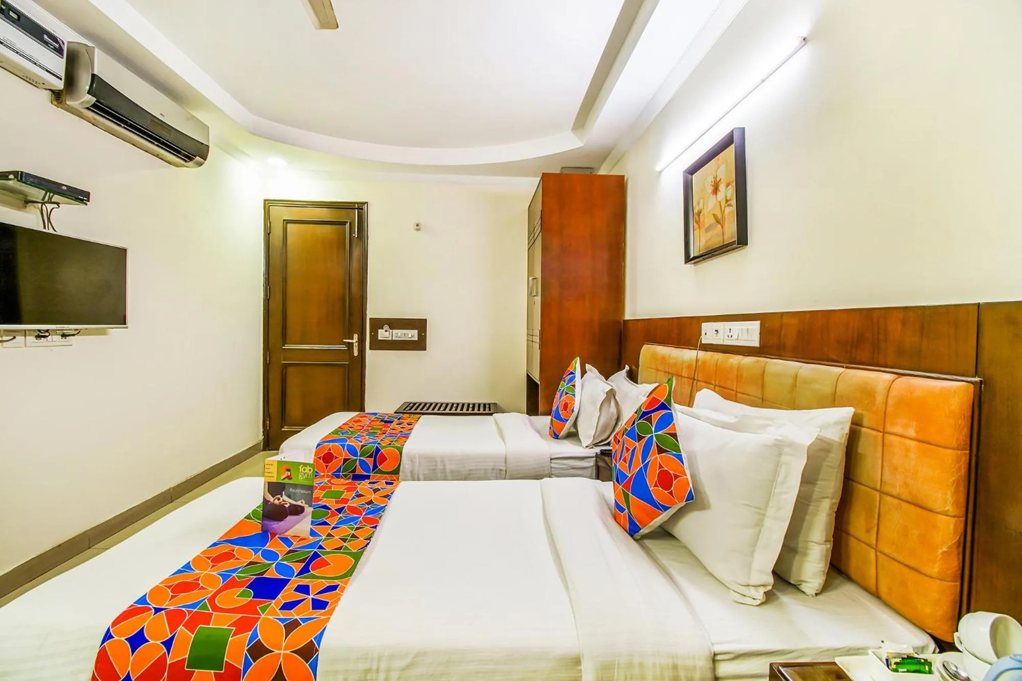 Bed in FabHotel Signature Plaza