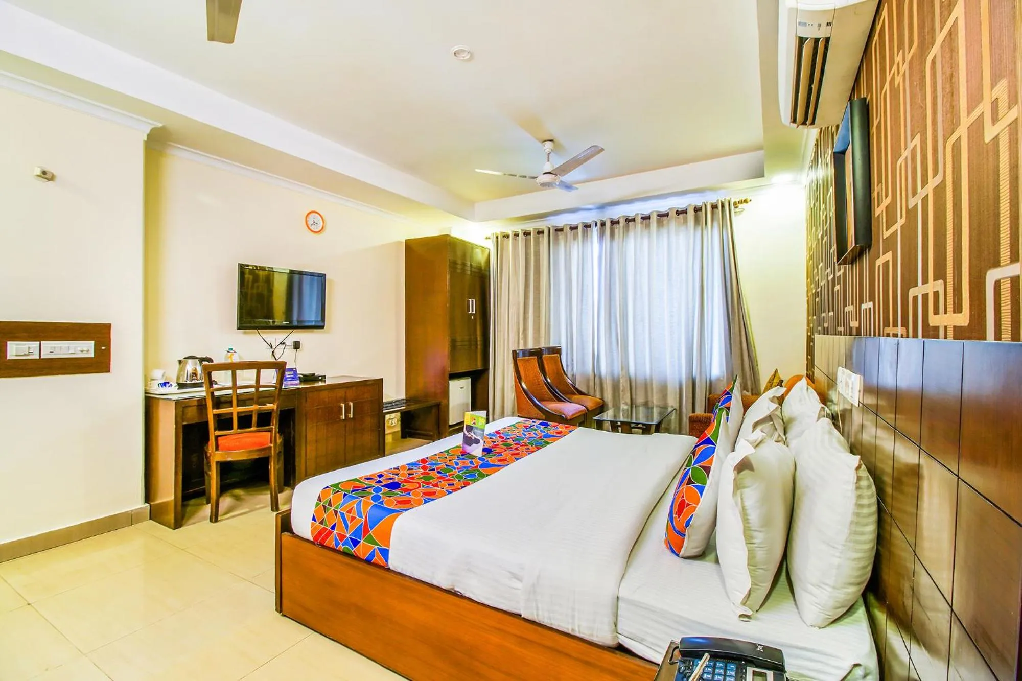 Bed in FabHotel Signature Plaza