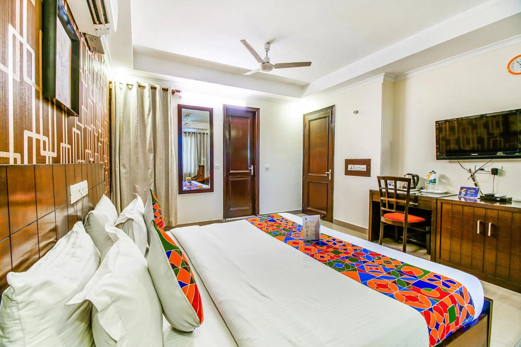 Bed in FabHotel Signature Plaza