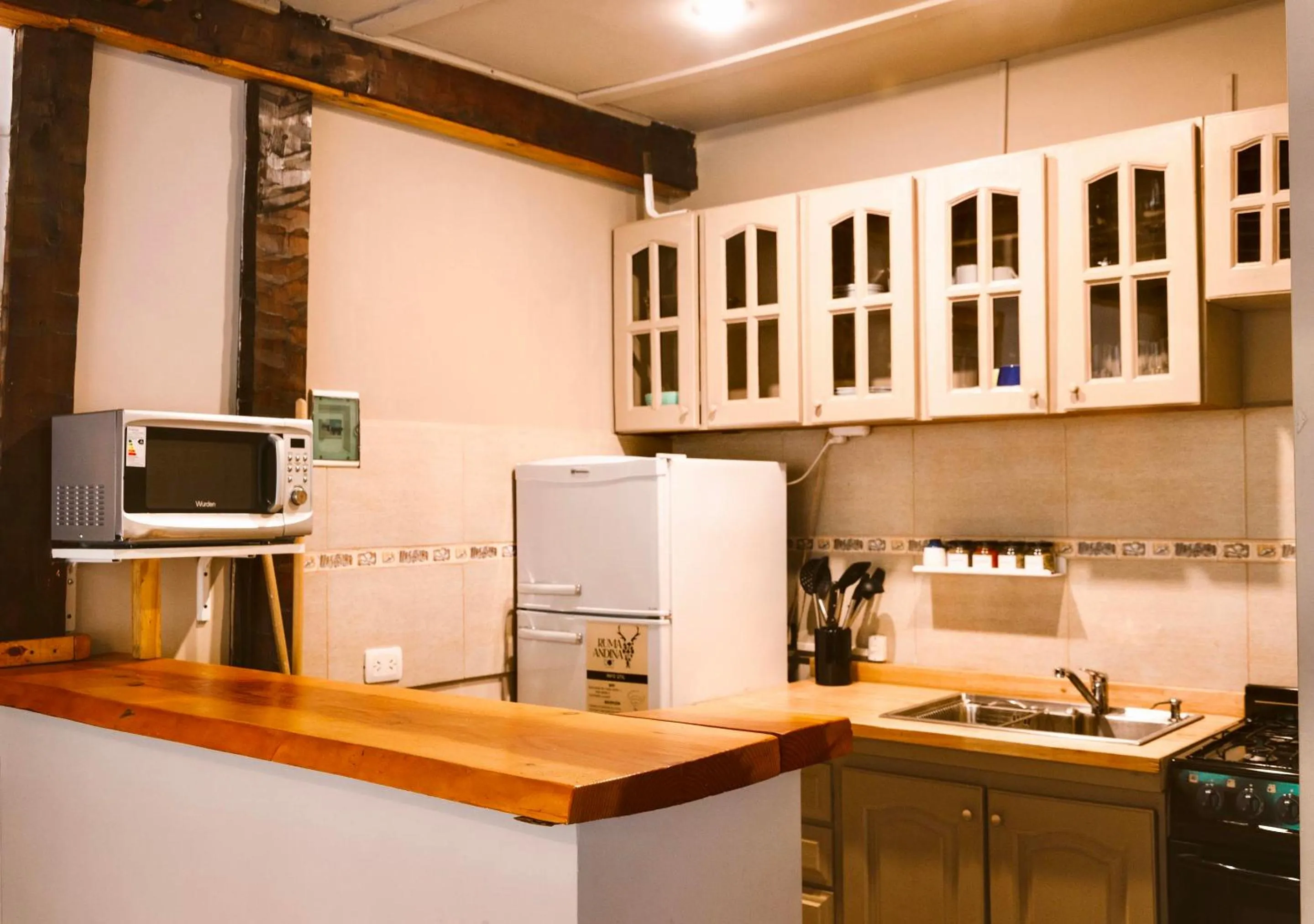 kitchen in Ruma Andina by DOT Cabana