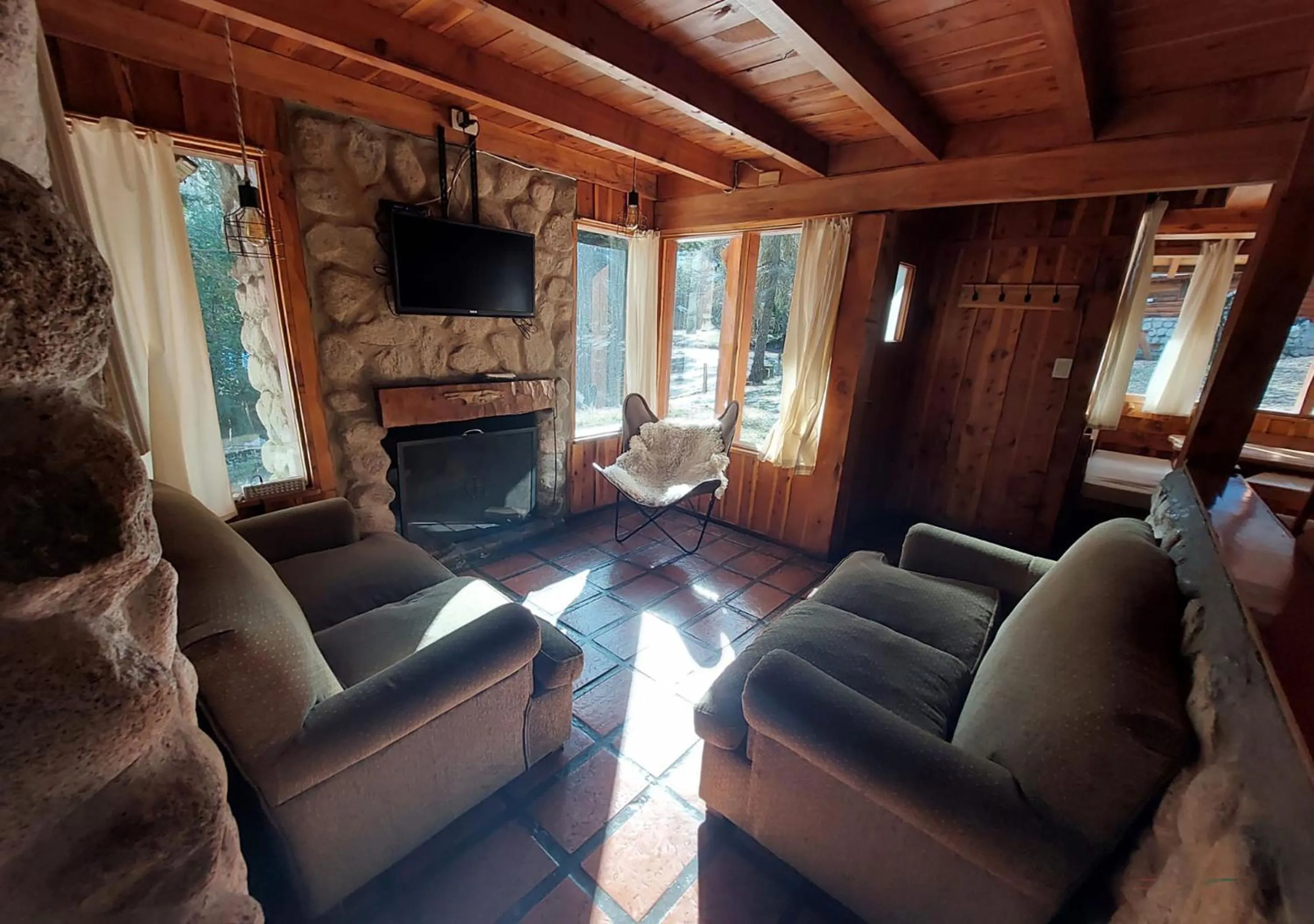 Living room in Ruma Andina by DOT Cabana