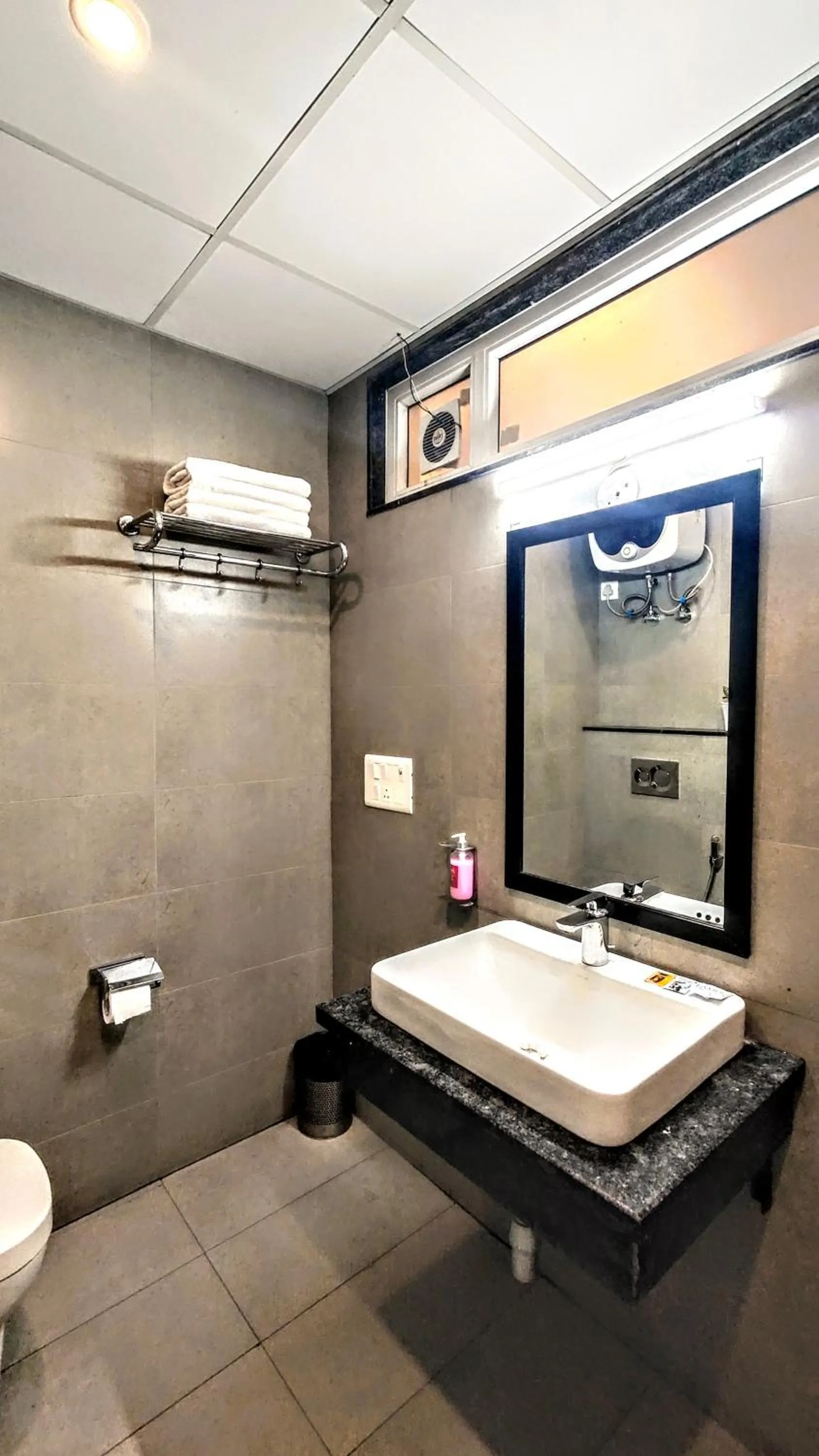 Bathroom in Hotel Mavens White Artemis Hospital Road Sector 52 Gurgaon