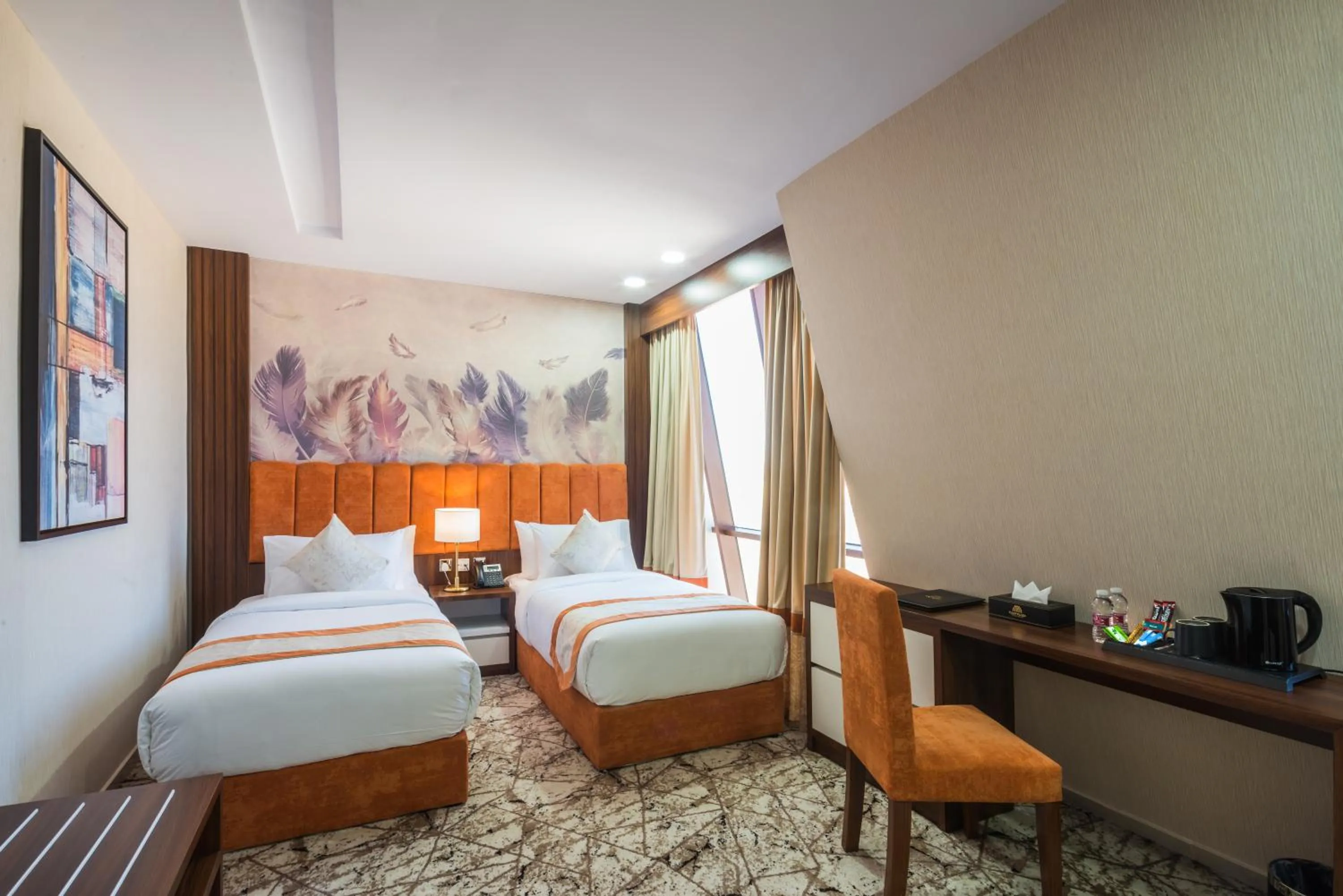 Bed in Tulip Plaza Hotel