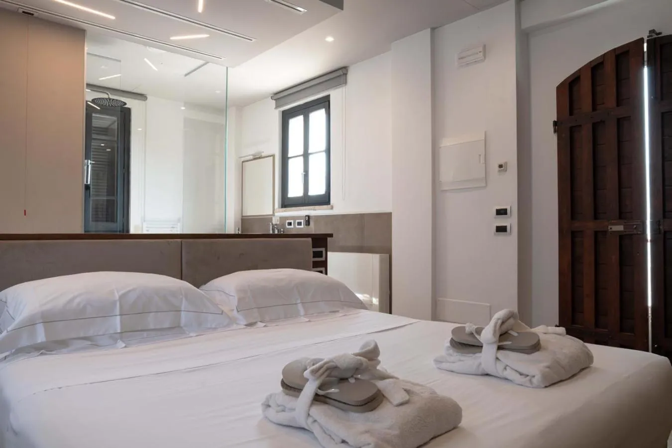 Bedroom, Bed in Le Cappuccinelle Suites&SPA