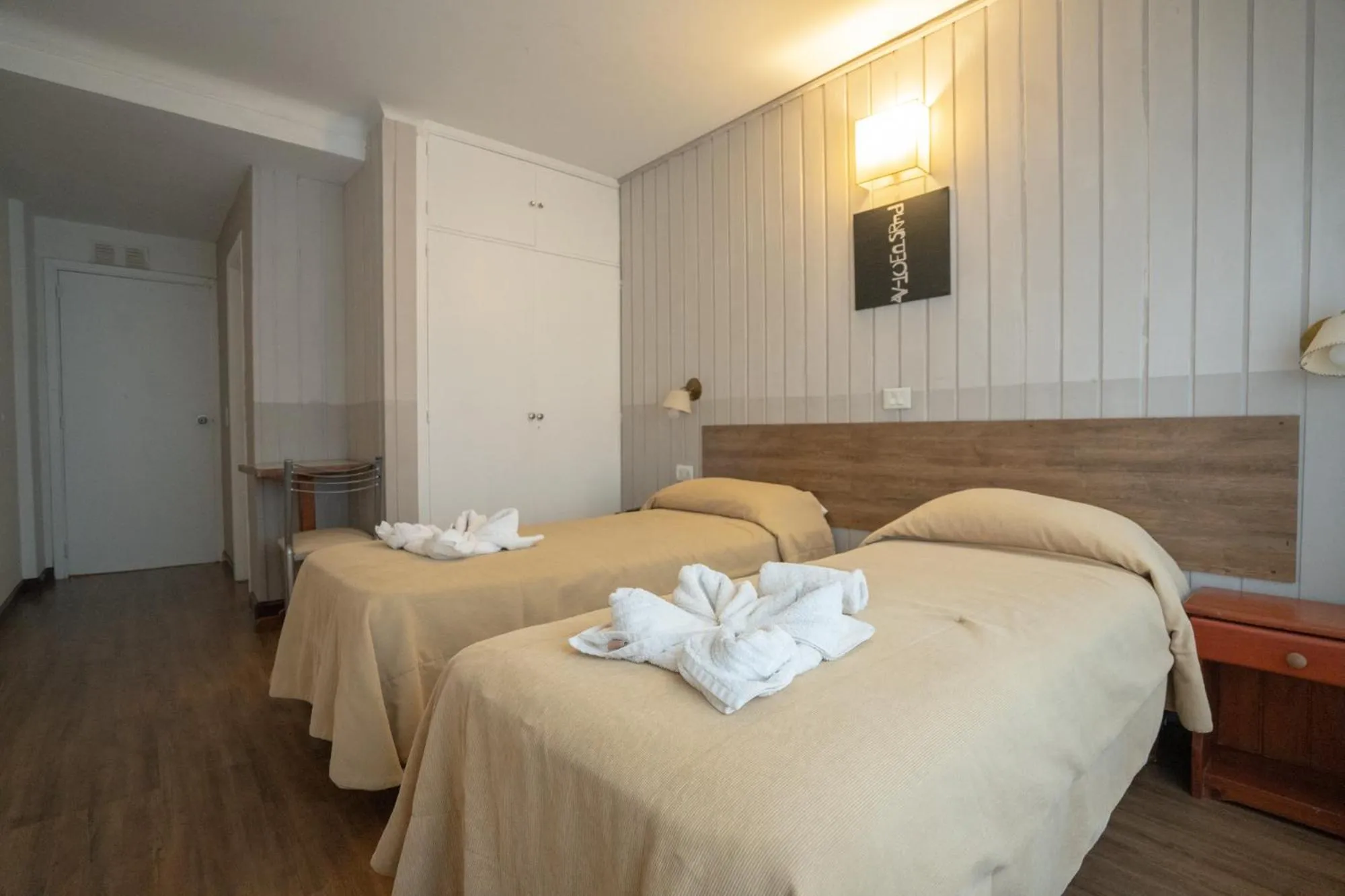 Bed in Tangoinn Club Hotel