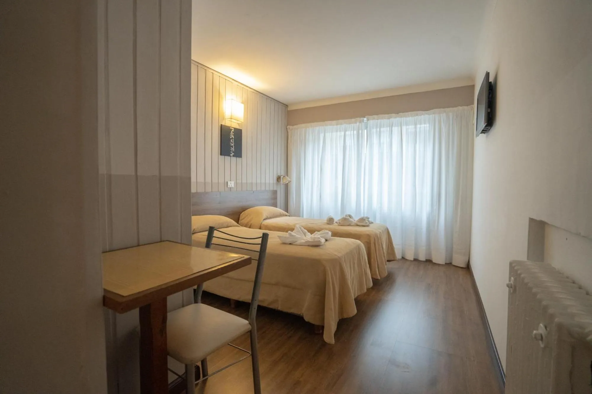 Bed in Tangoinn Club Hotel