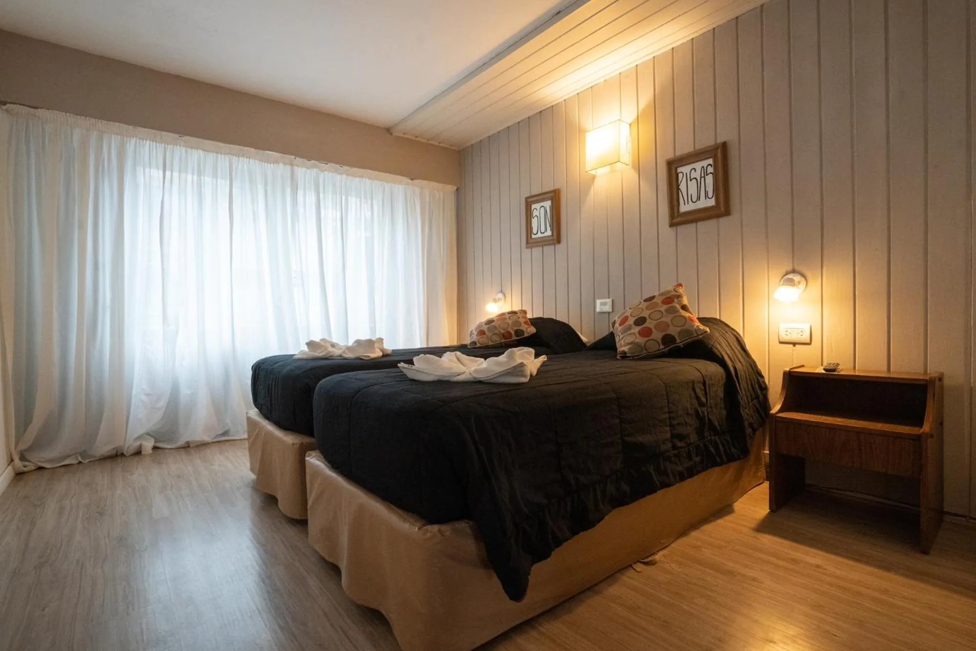 Bed in Tangoinn Club Hotel