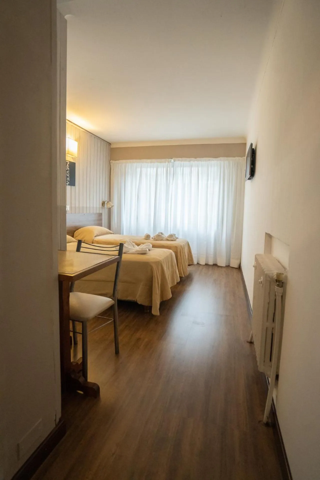 Bed in Tangoinn Club Hotel