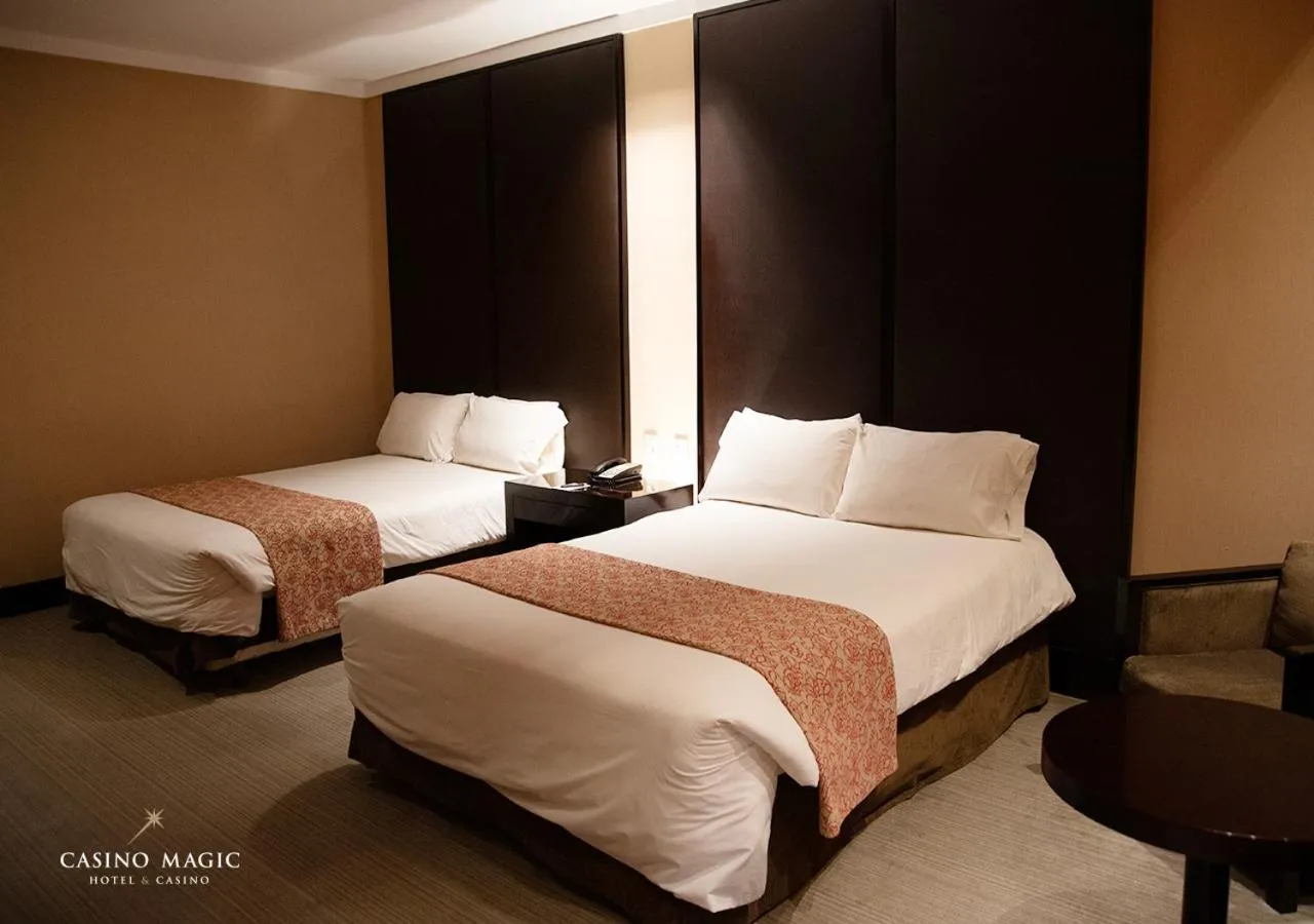 Bed in Hotel Casino Magic