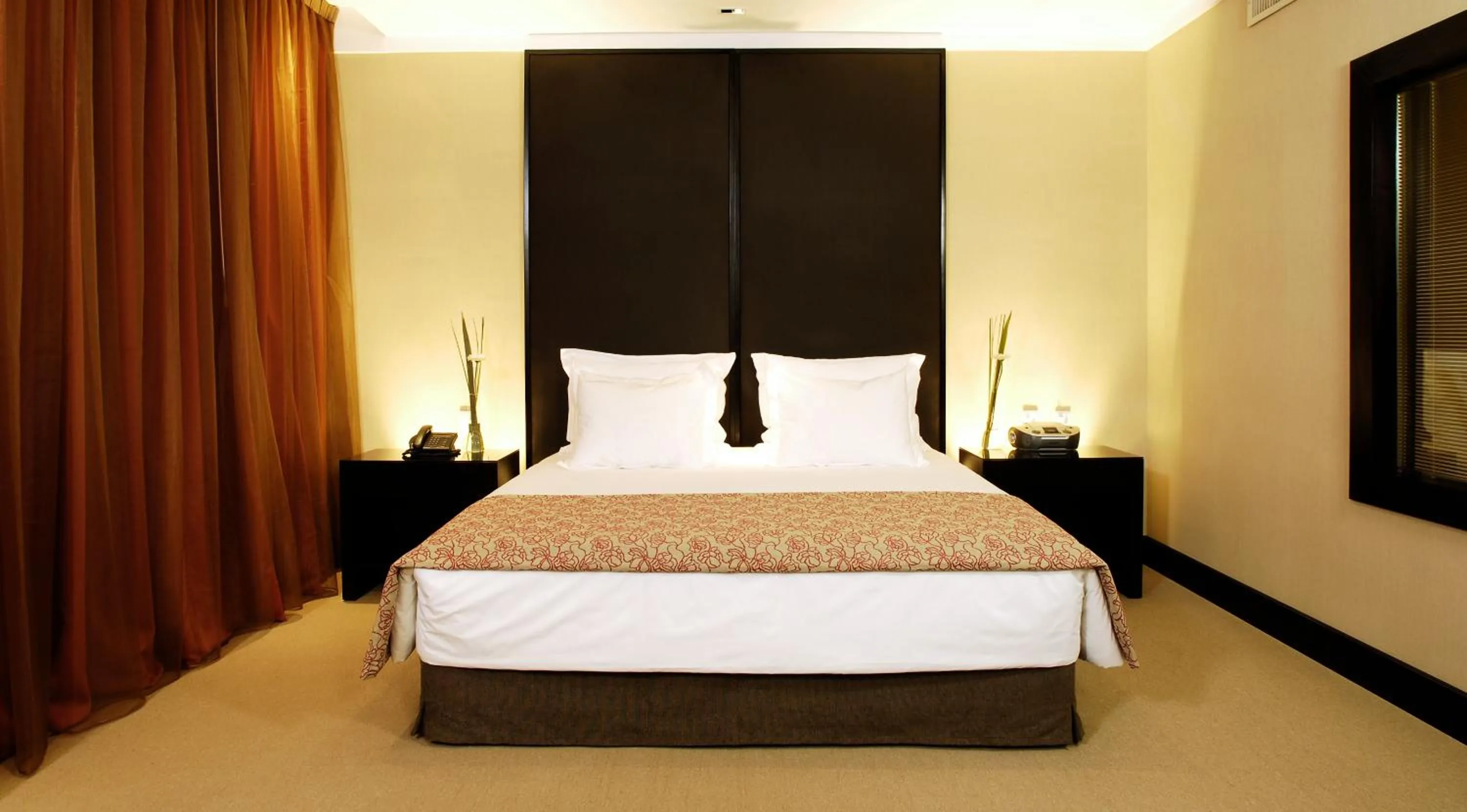 Bed in Hotel Casino Magic