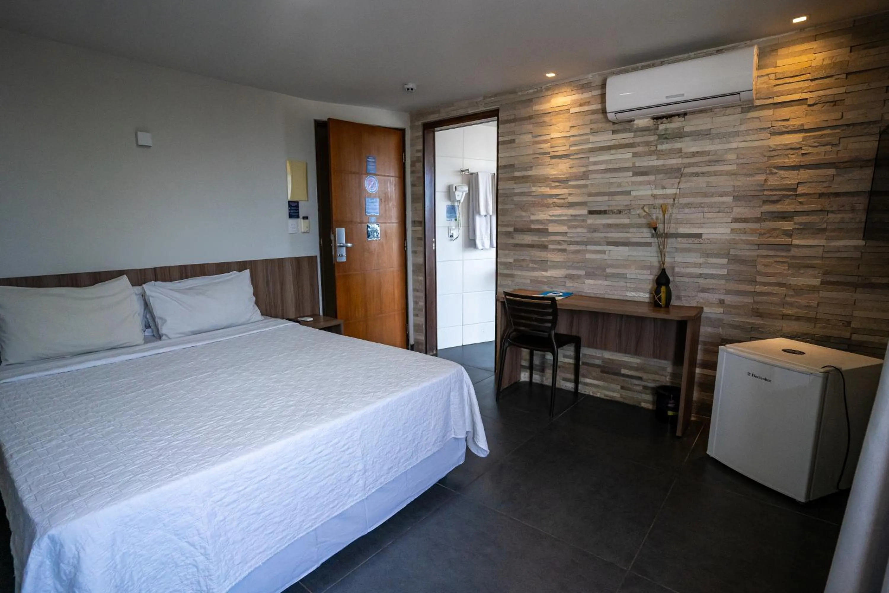 Bed in Bessa Beach Hotel