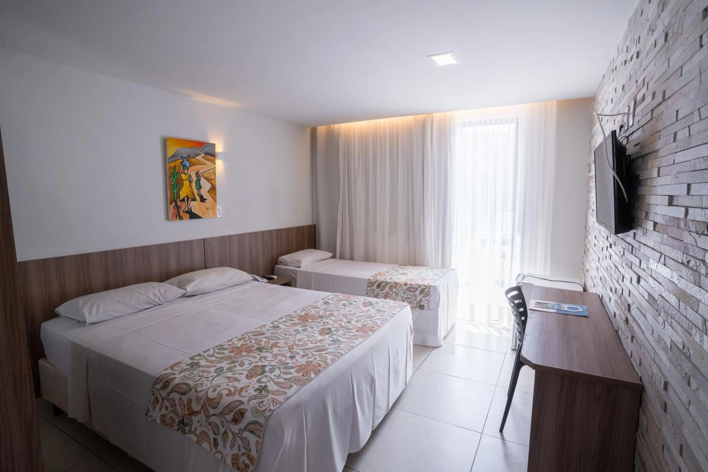 Bed in Bessa Beach Hotel