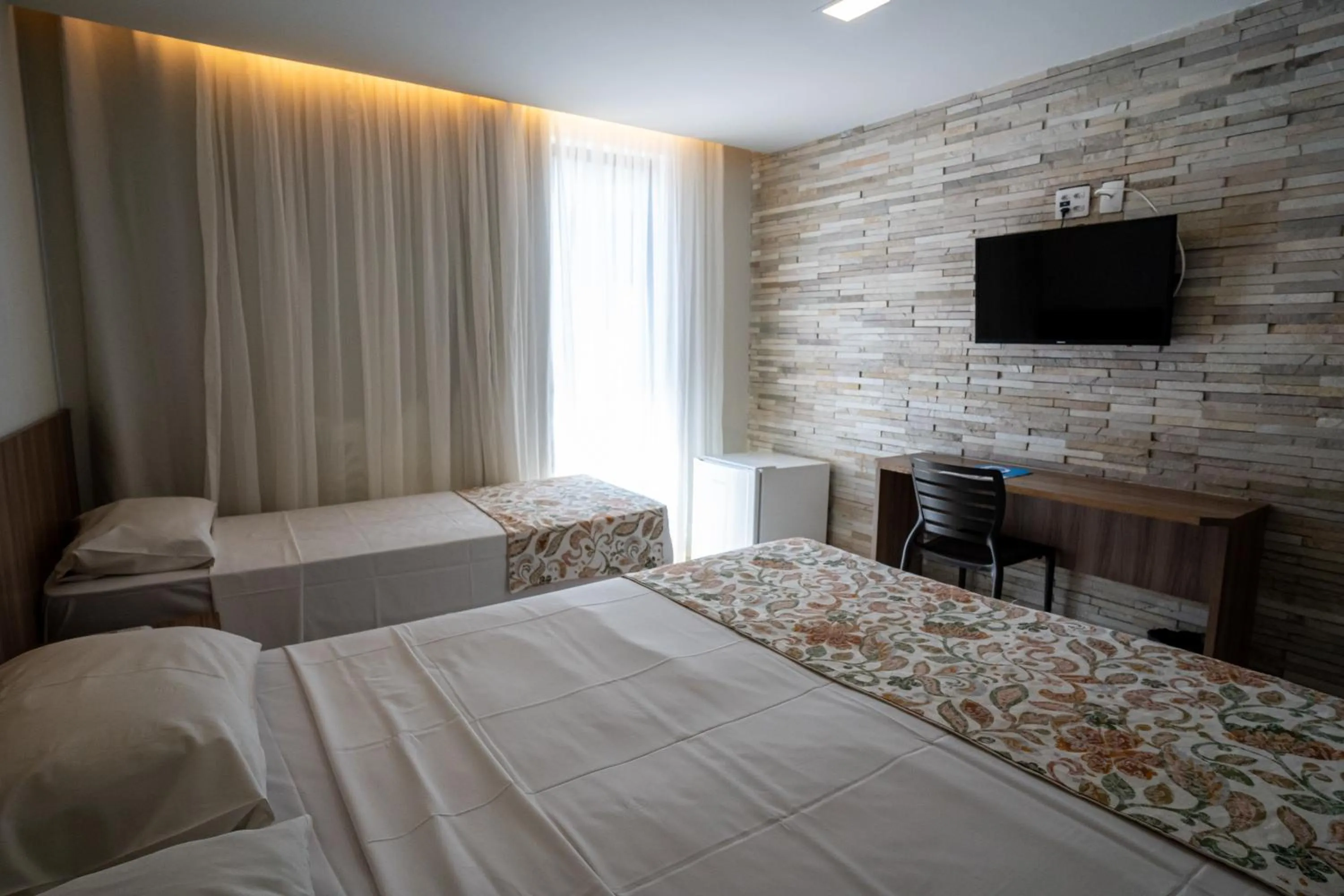 Bed in Bessa Beach Hotel