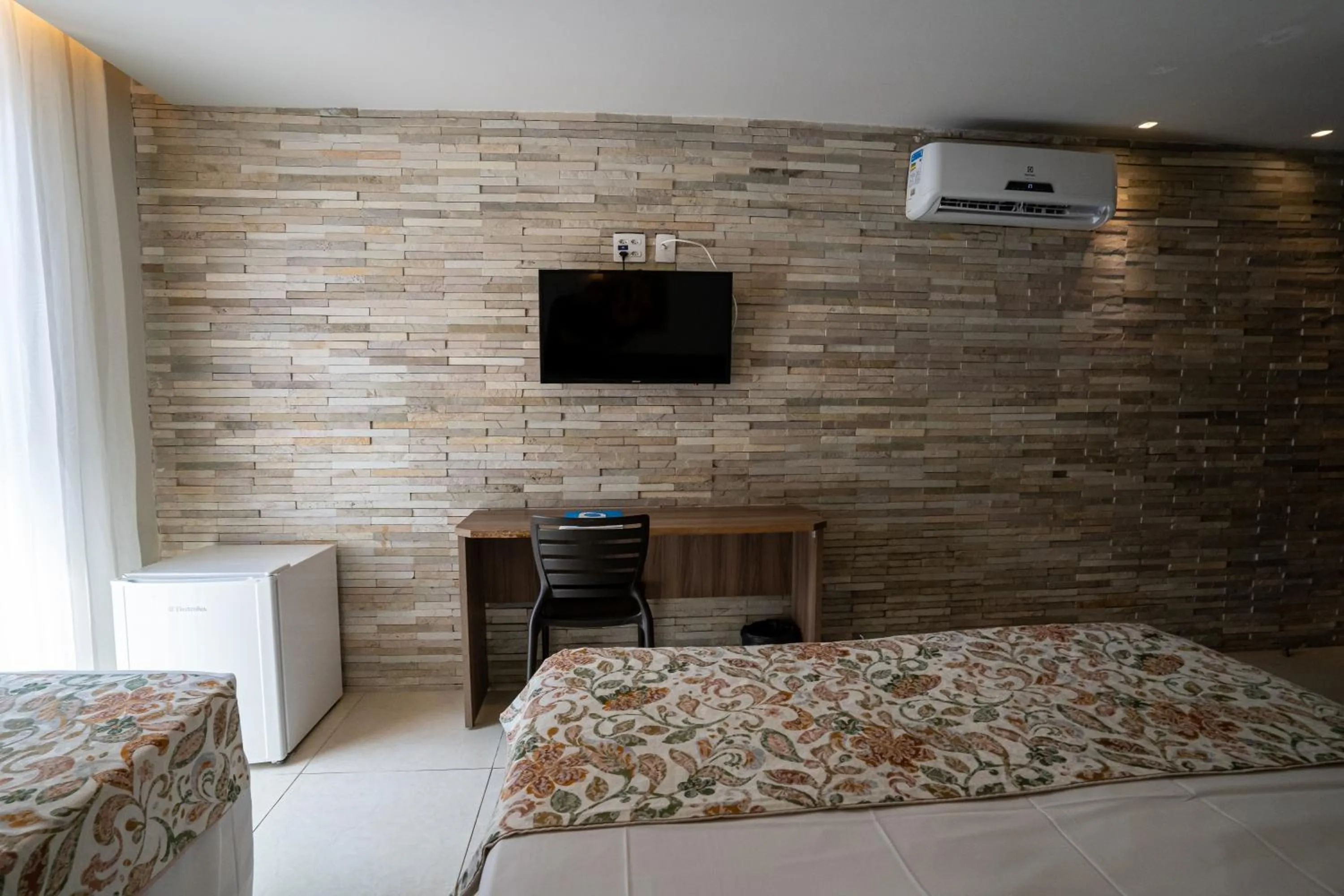 Bed in Bessa Beach Hotel