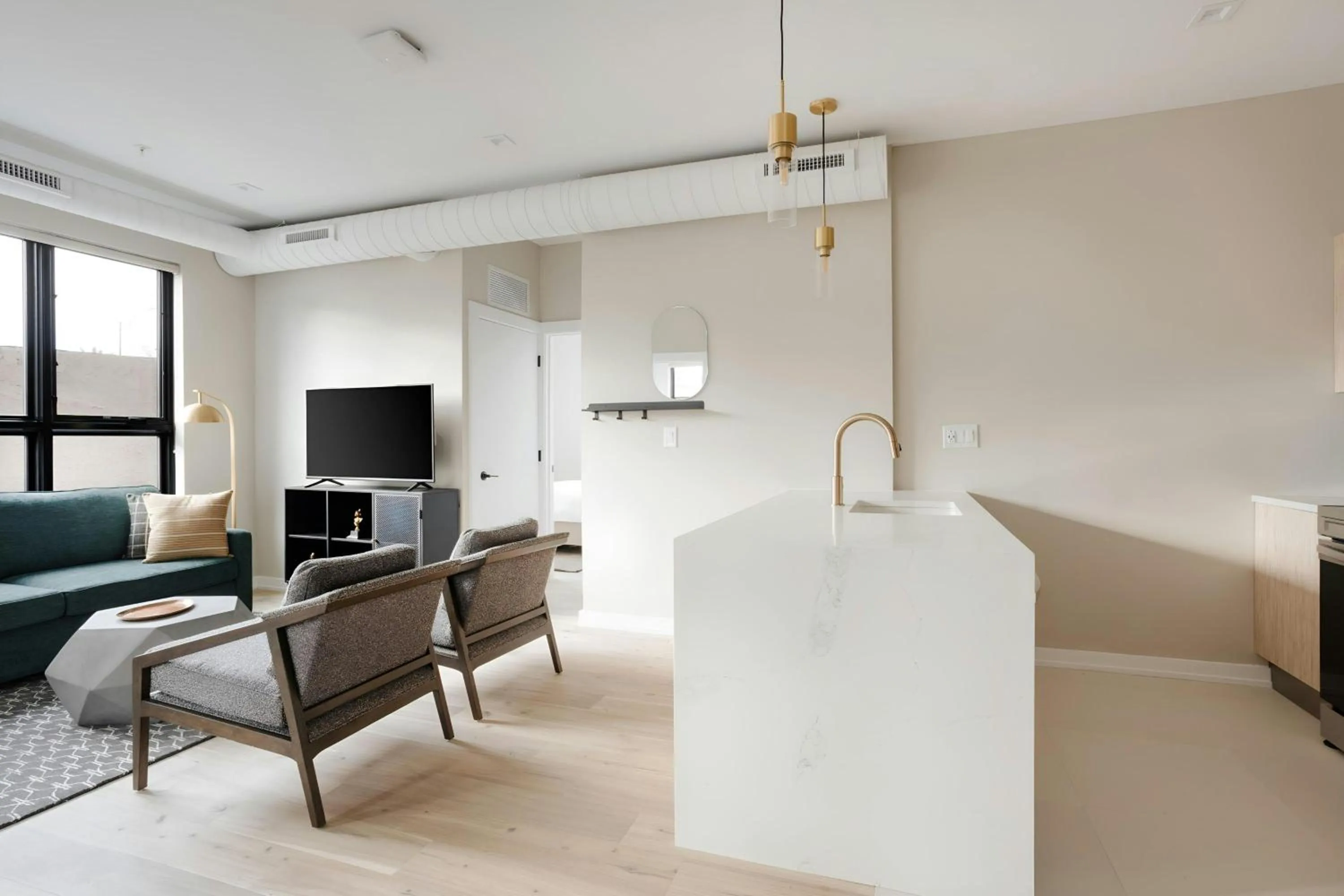 Living room in Sonder by Marriott Bonvoy The Edison Apartments Old City