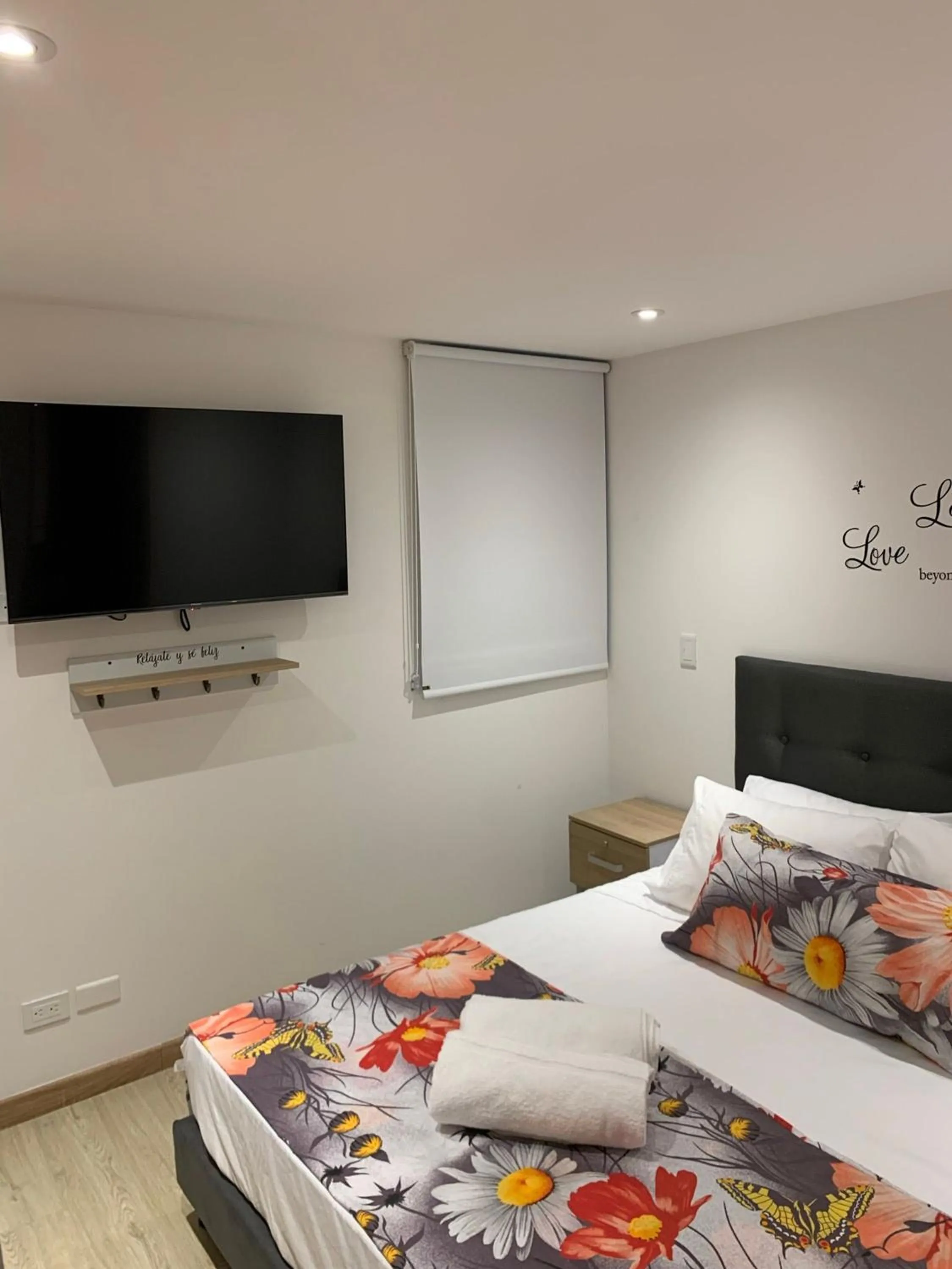 Bed in Apartamentos Avenida del malecón, frente al lago. Guatape