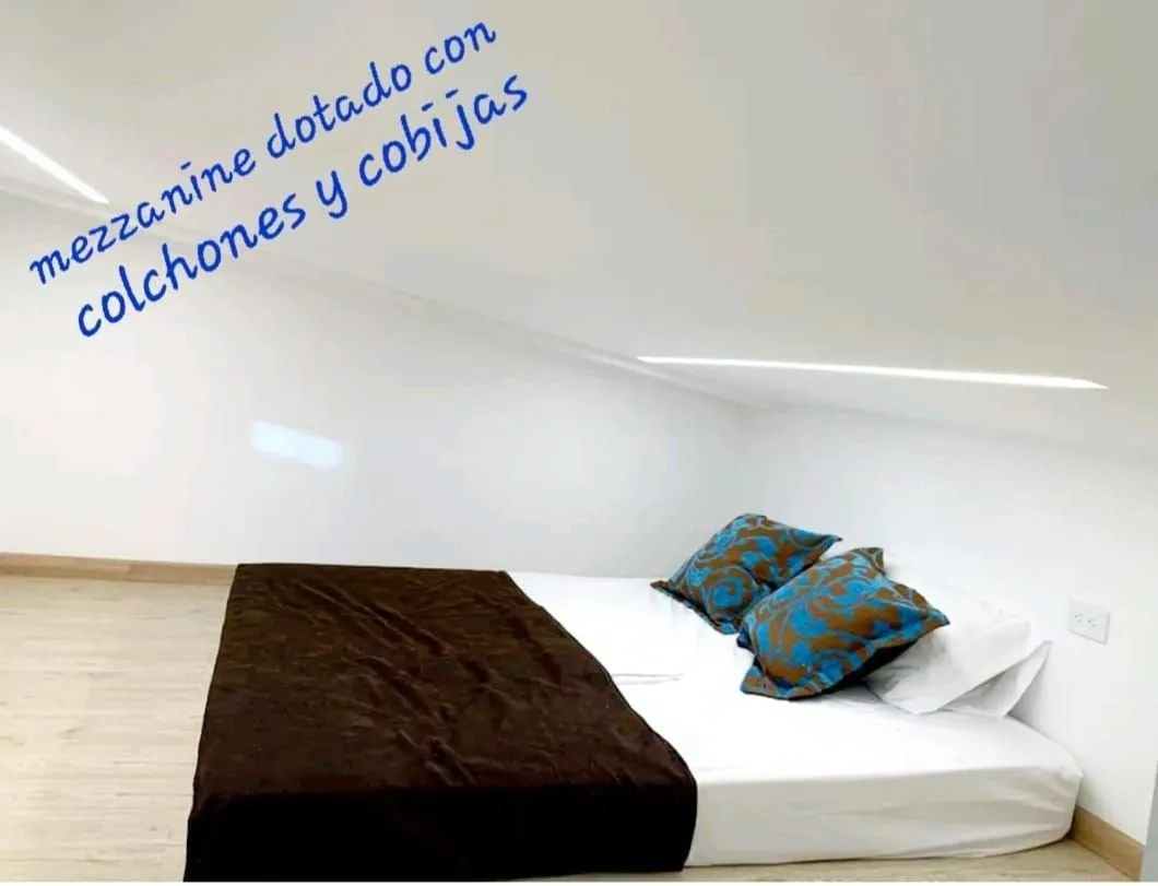 Bed in Apartamentos Avenida del malecón, frente al lago. Guatape