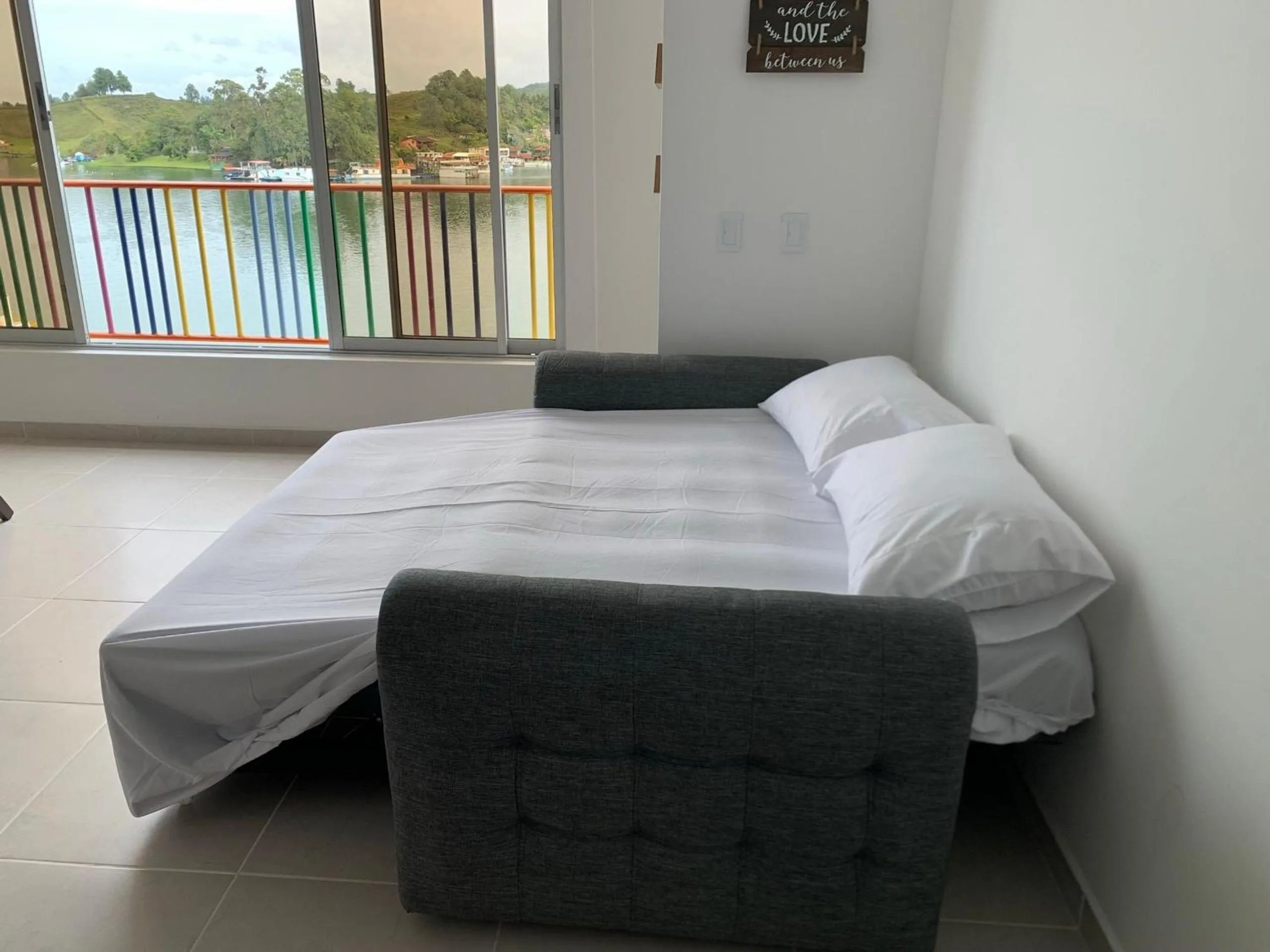 Bed in Apartamentos Avenida del malecón, frente al lago. Guatape