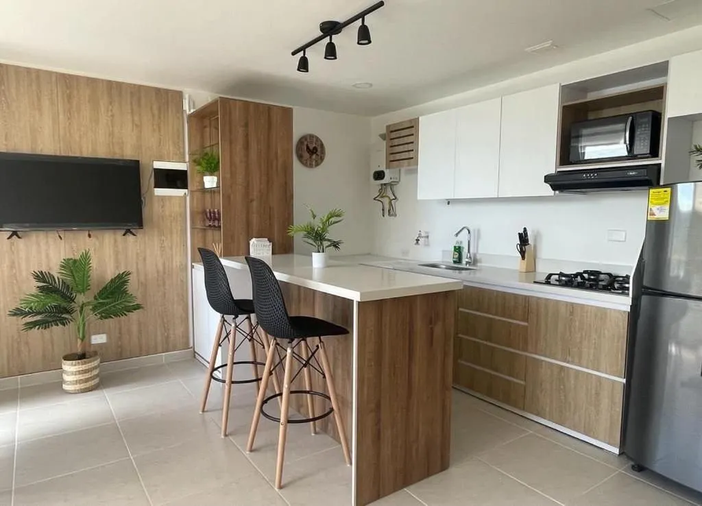 Photo of the whole room in Apartamentos Avenida del malecón, frente al lago. Guatape