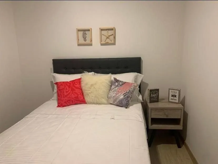 Bed in Apartamentos Avenida del malecón, frente al lago. Guatape