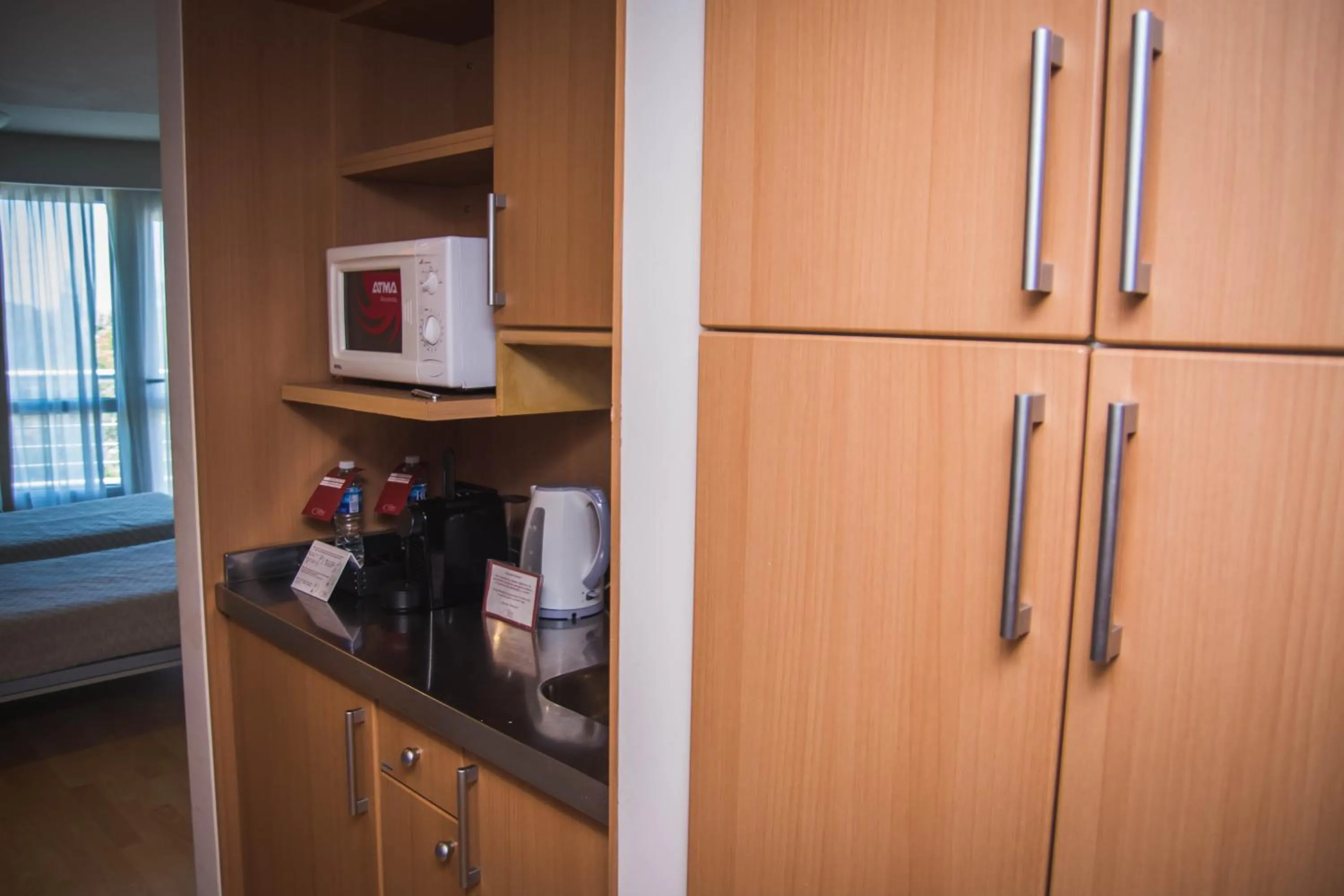 Kitchen or kitchenette in Maran Suites & Towers