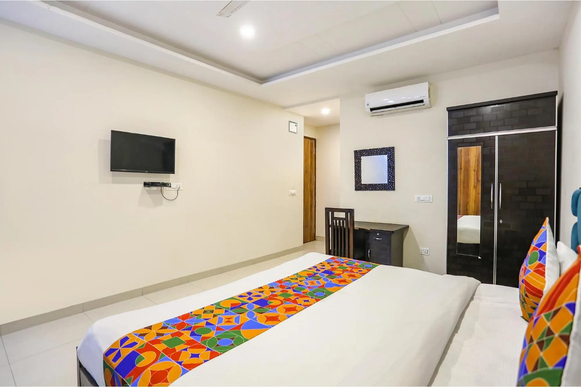 Bed in FabHotel Shiv Rachna - Mansarovar
