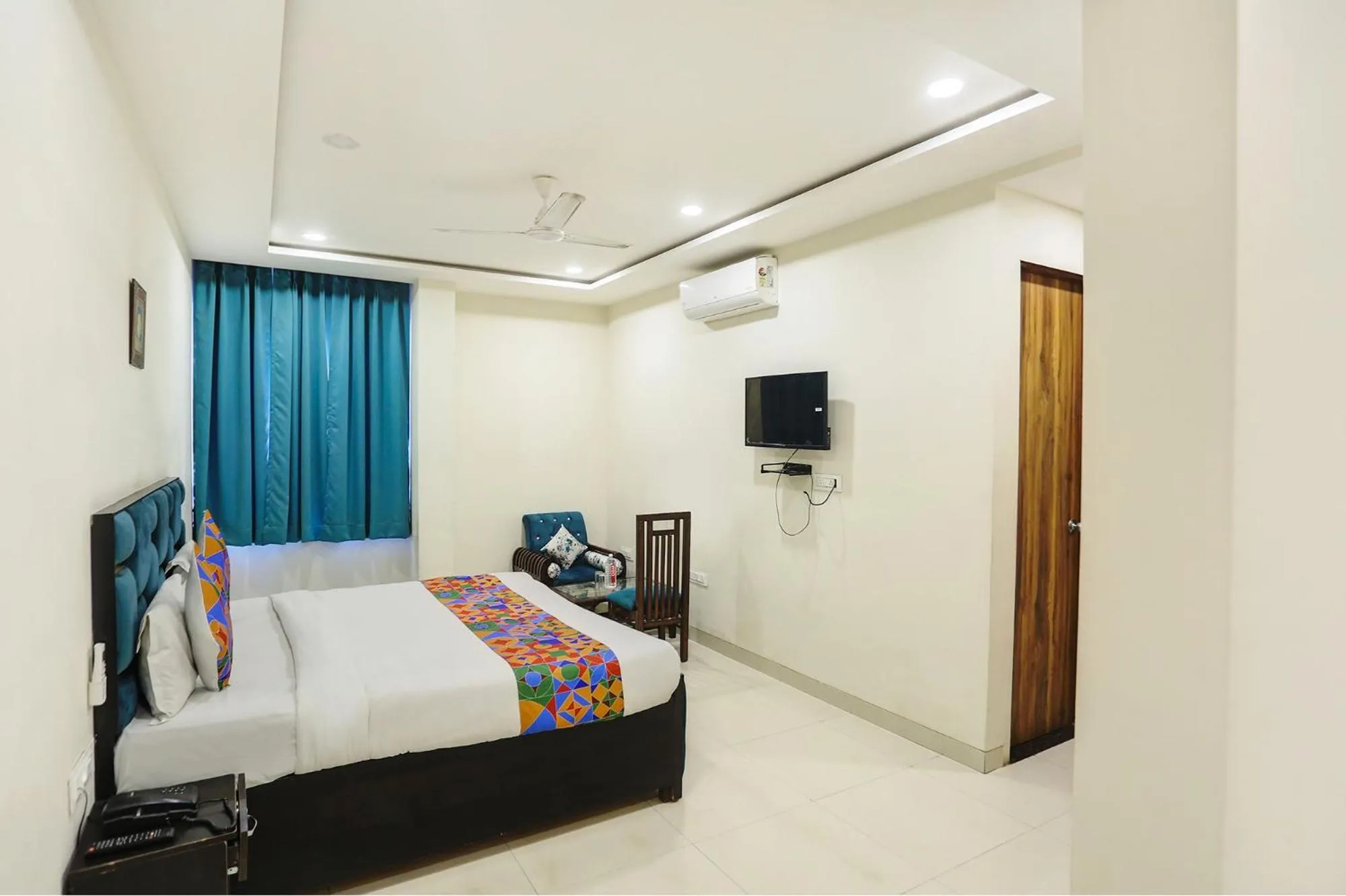 Bed in FabHotel Shiv Rachna - Mansarovar
