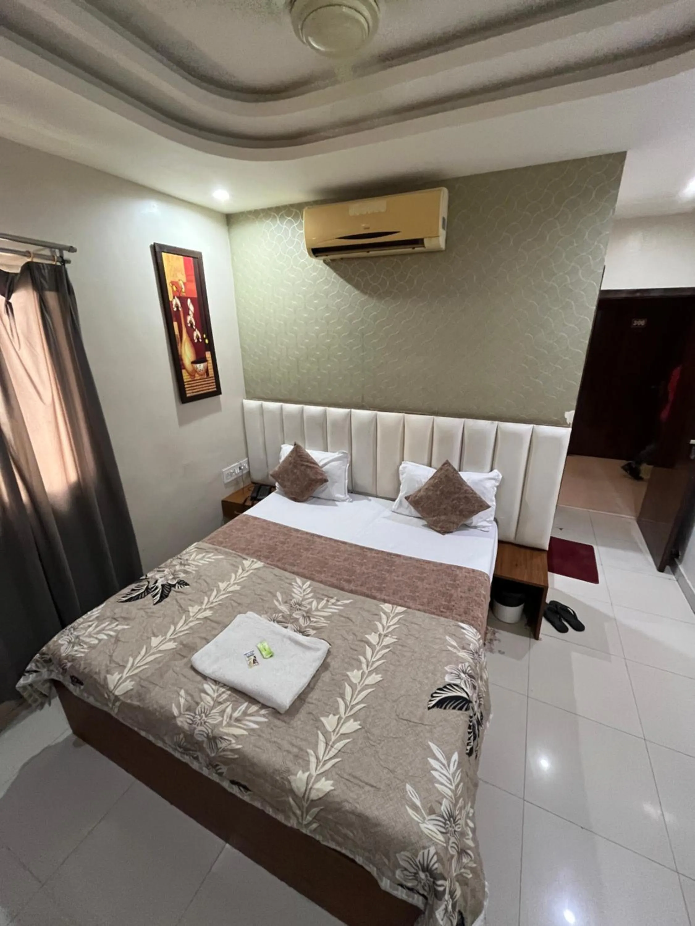 Bed in Hotel Siddhi Vinayak