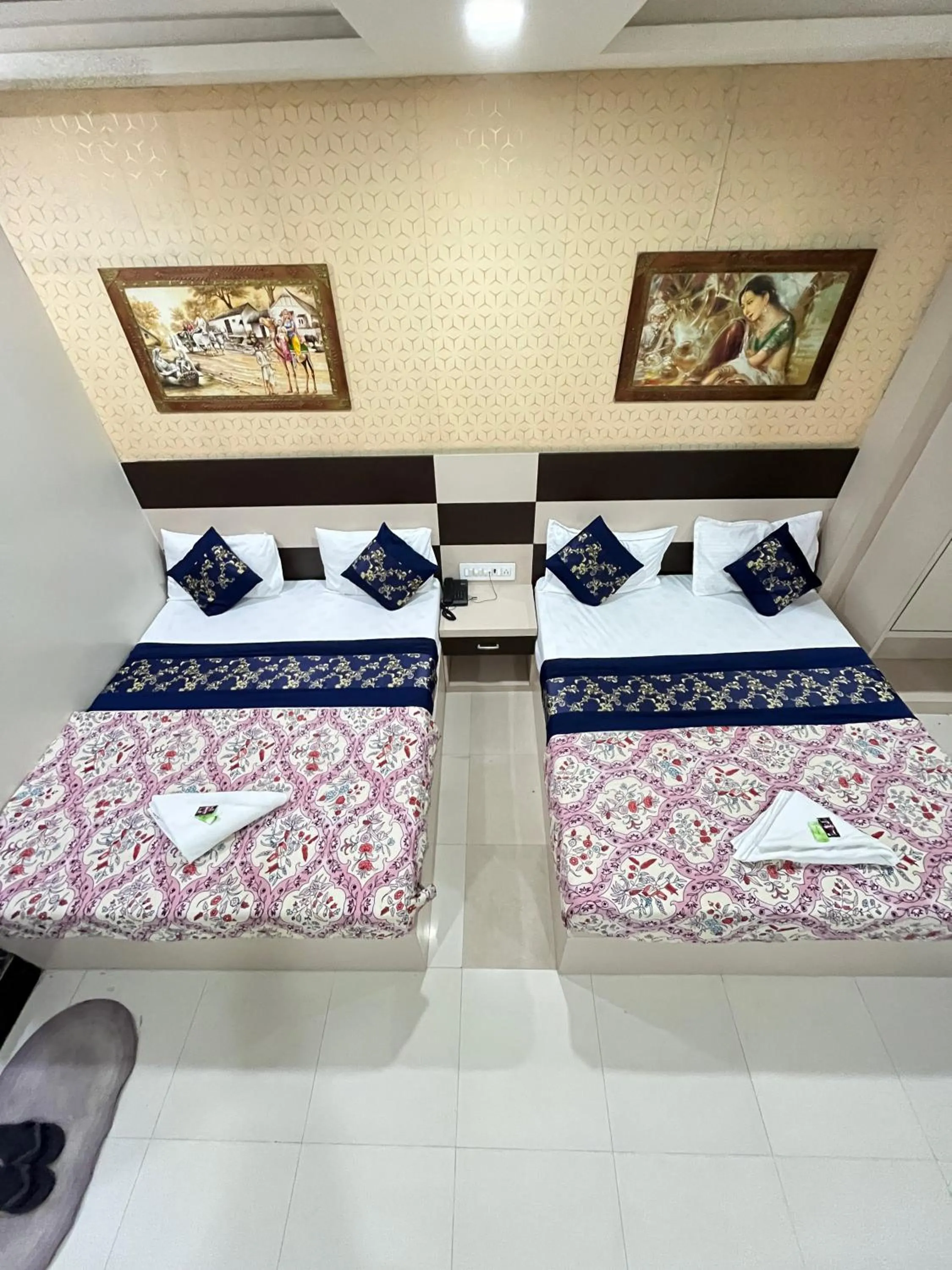 Bed in Hotel Siddhi Vinayak