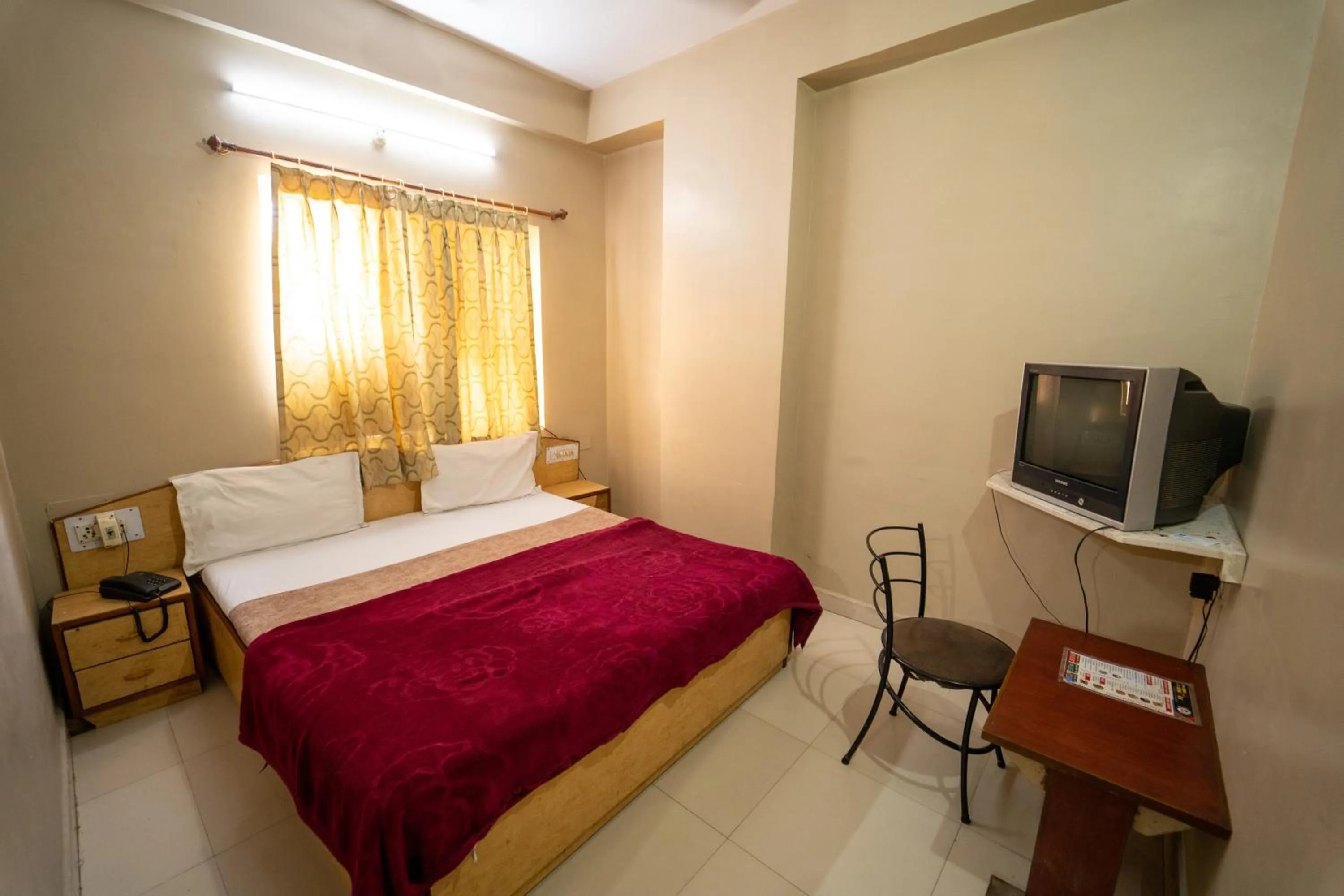 Bed in Hotel Siddhi Vinayak