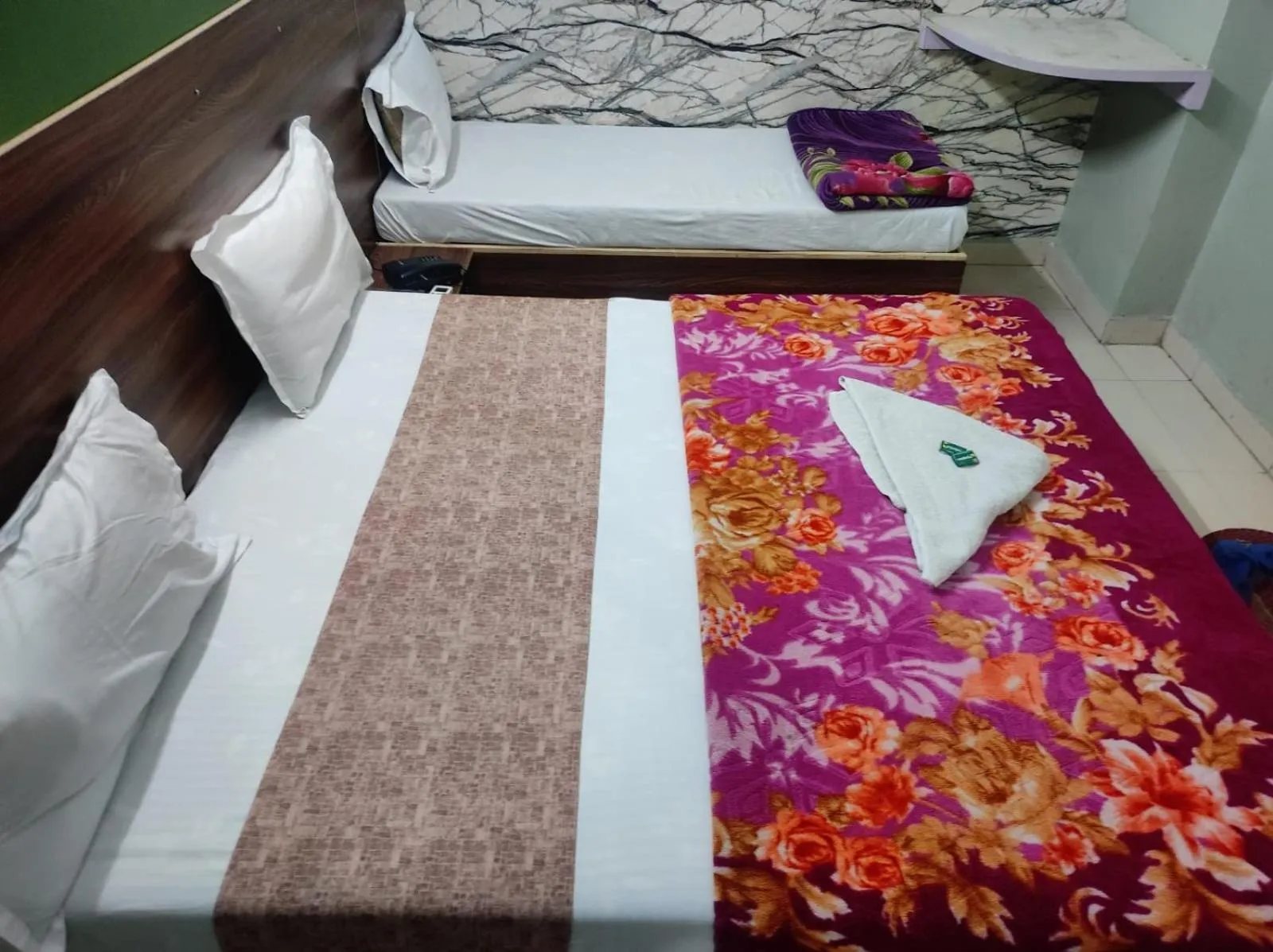 Bed in Hotel Siddhi Vinayak
