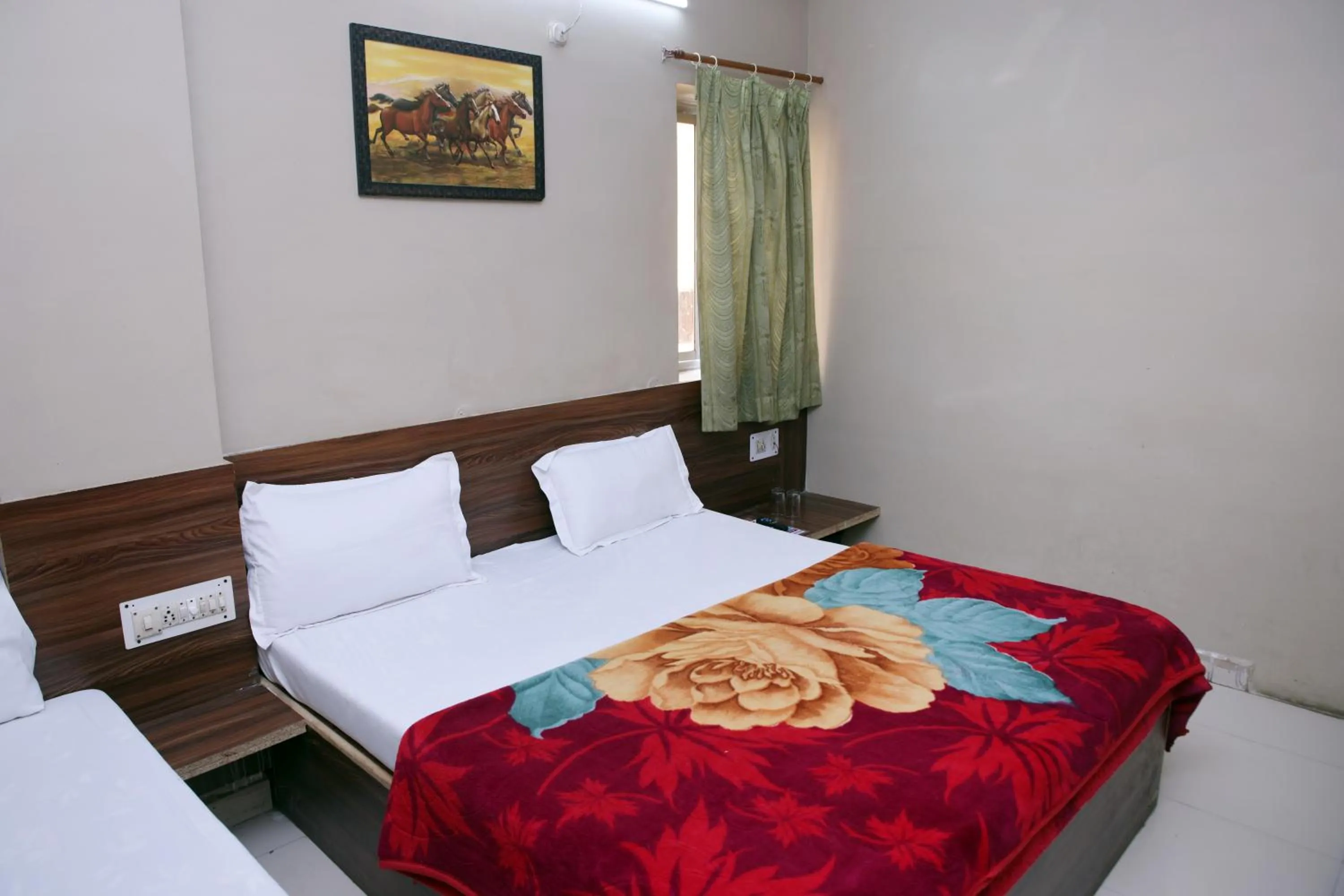 Bed in Hotel Siddhi Vinayak