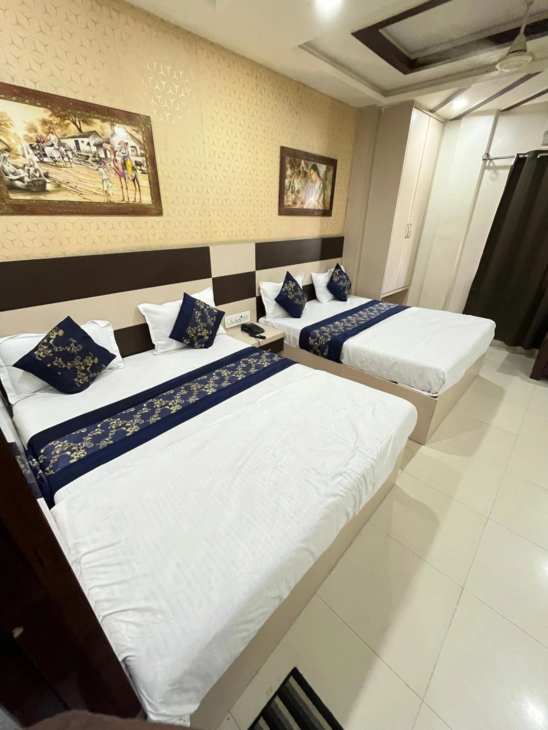 Bed in Hotel Siddhi Vinayak