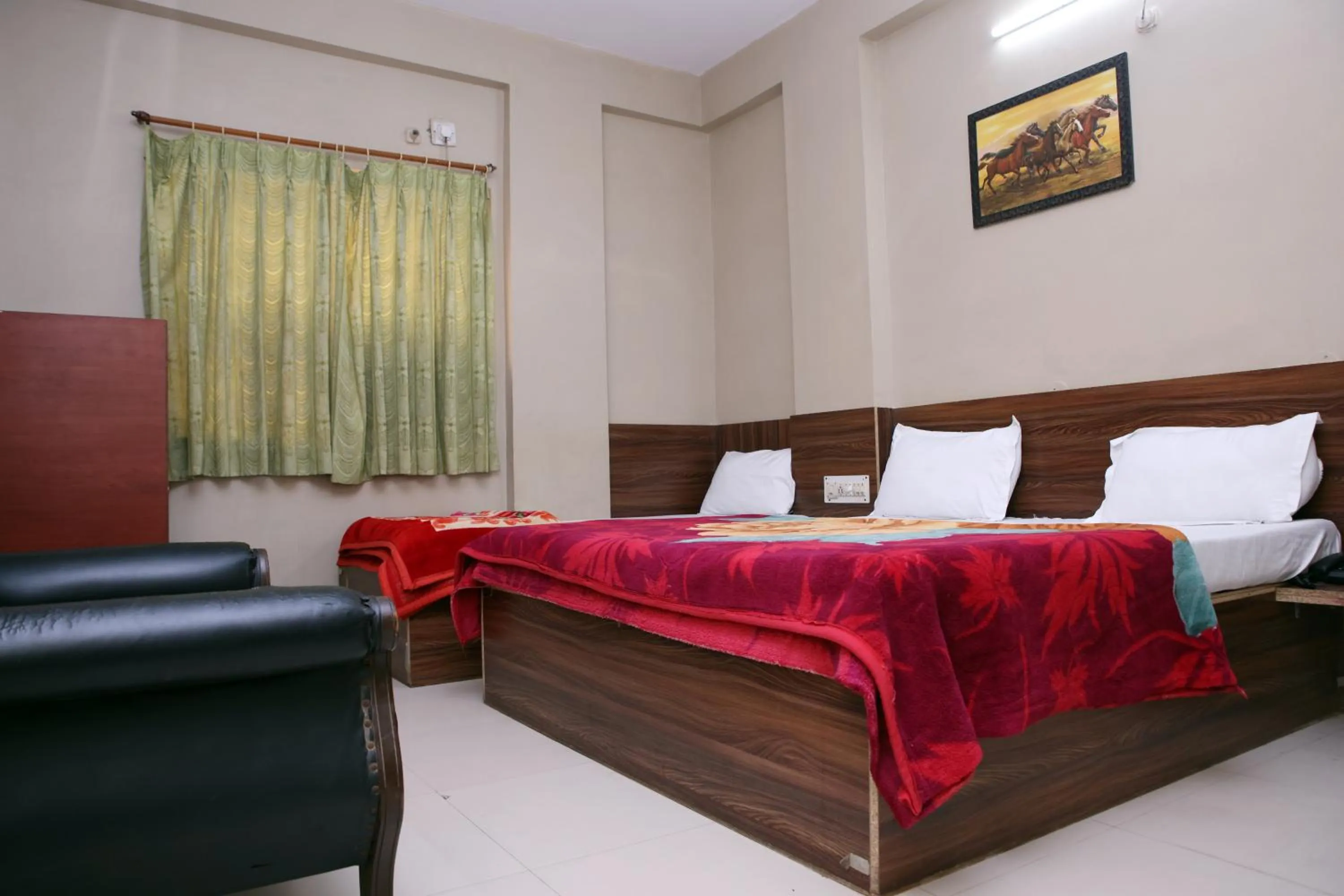 Bed in Hotel Siddhi Vinayak
