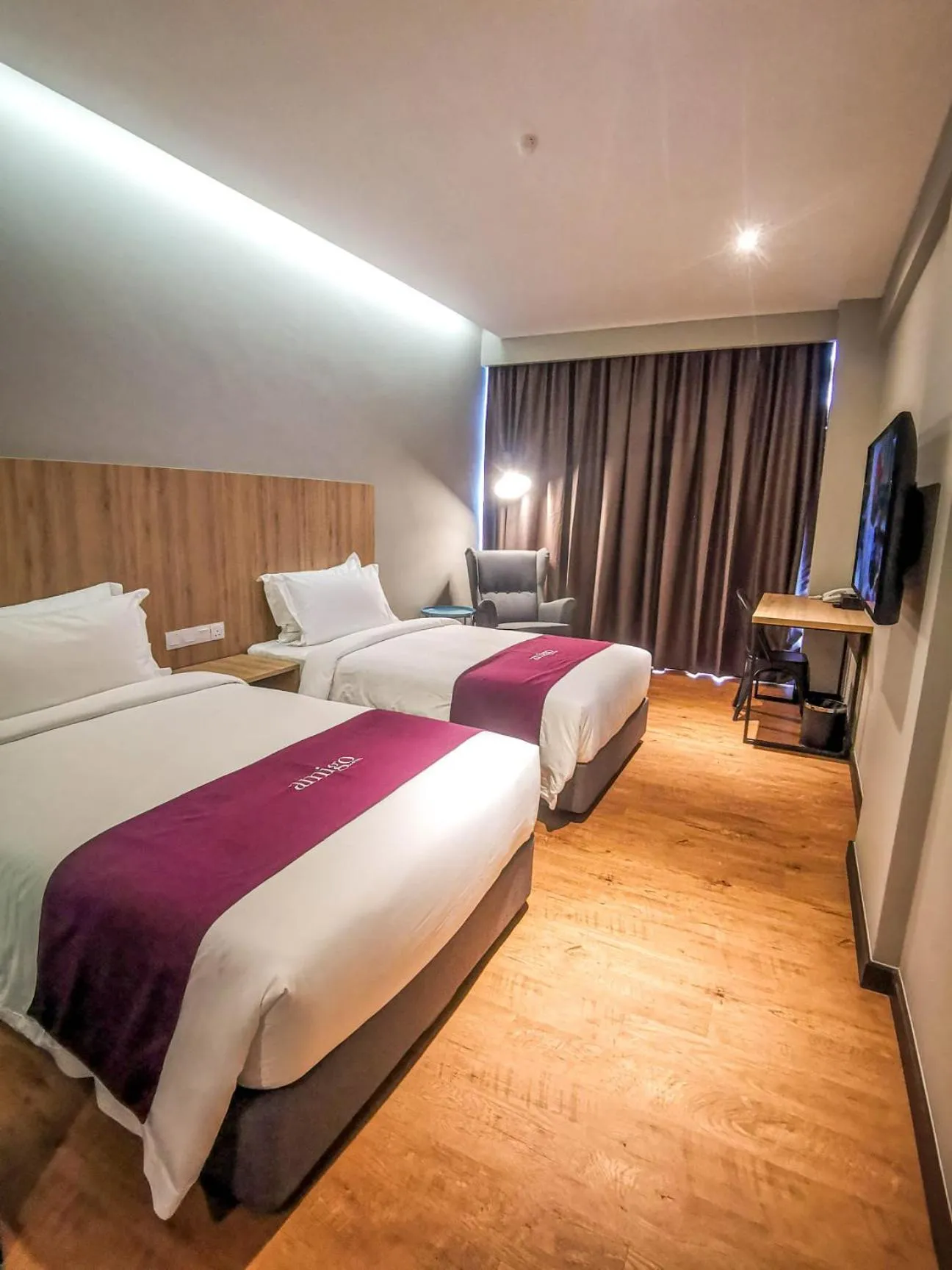 Photo of the whole room, Bed in Amigo Hotel Bintulu