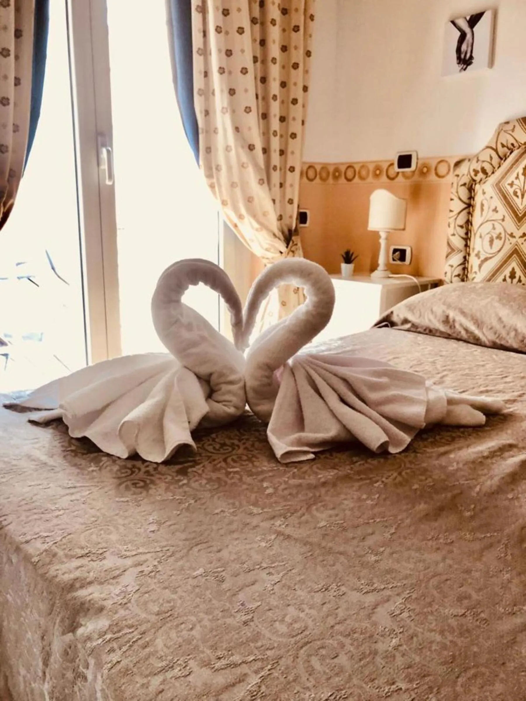 Bed in Gregorio's Rooms