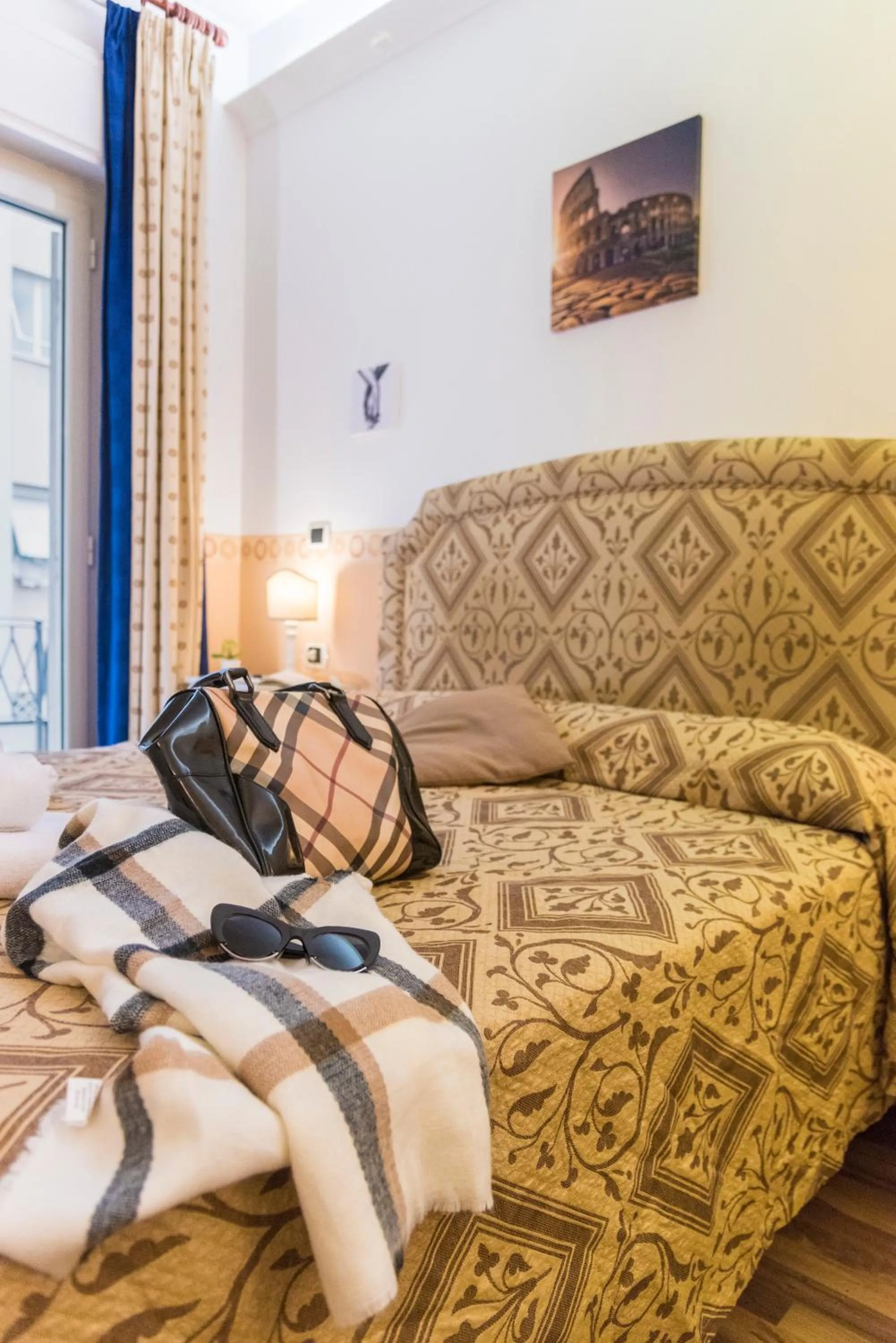 Bed in Gregorio's Rooms