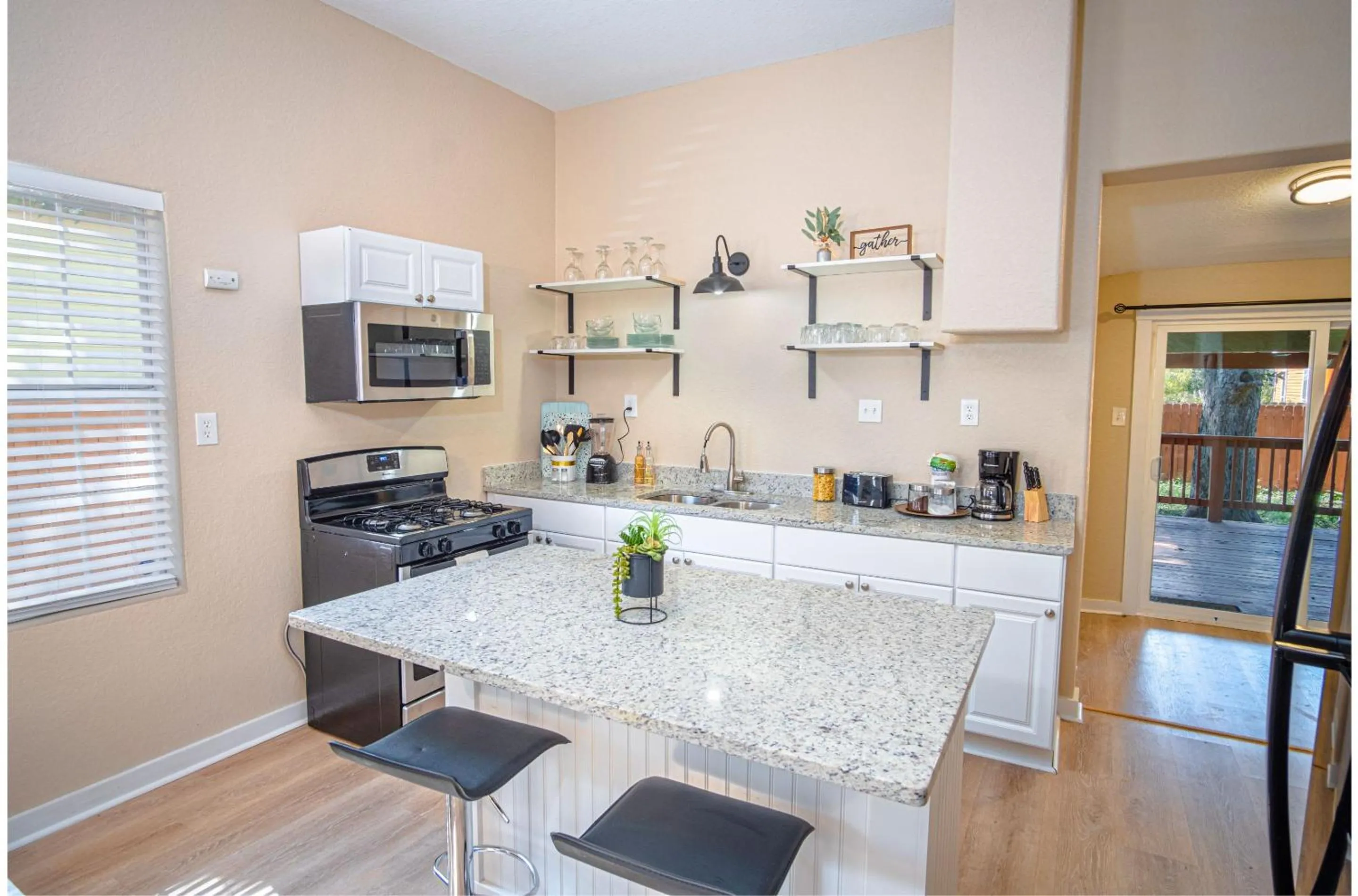 Kitchen or kitchenette in 3 BR1 BA Remodeled Home Near Downtown