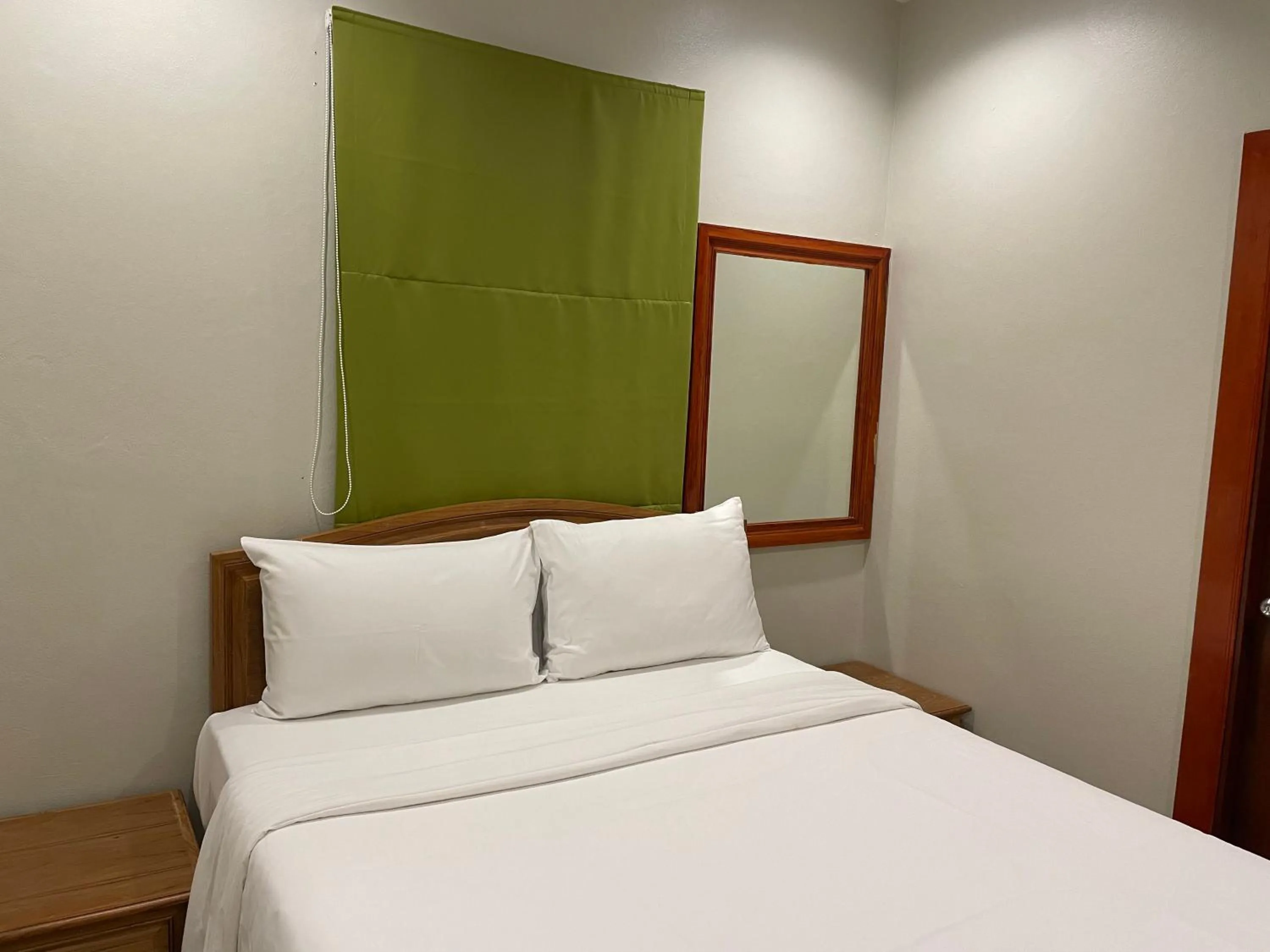 Bed in The Pace Phuket Boutique Resort