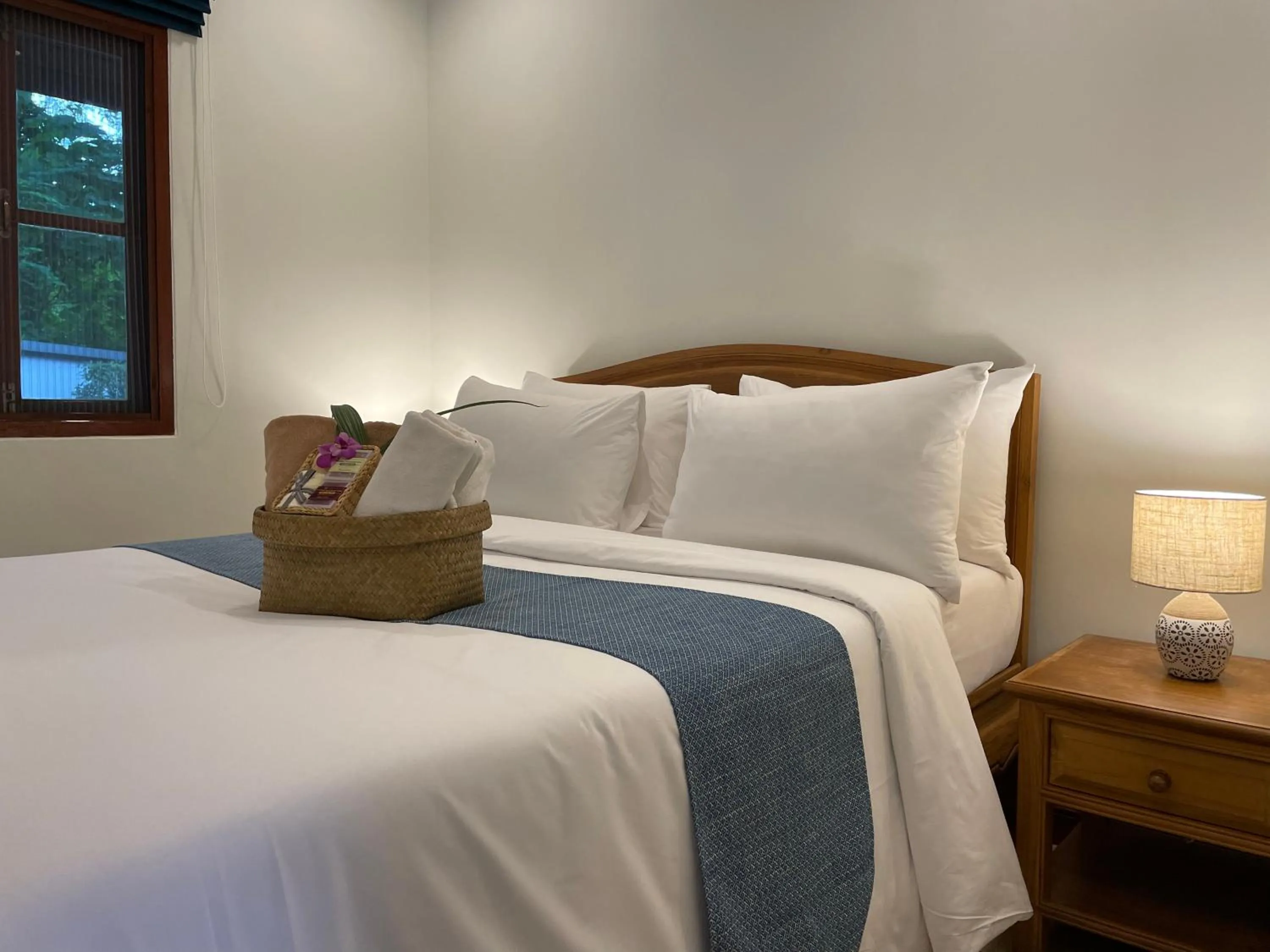 Bed in The Pace Phuket Boutique Resort