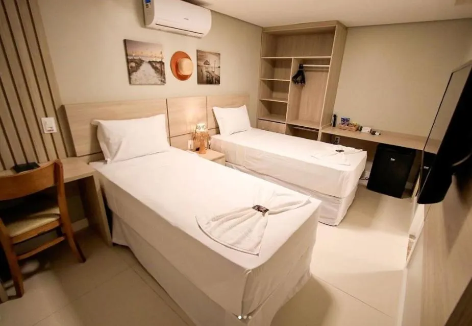 Bed in Paraiso Beach Hotel