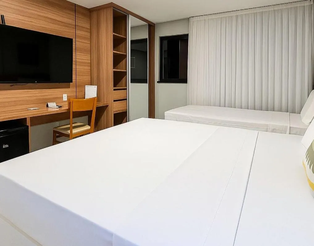 Bed in Paraiso Beach Hotel