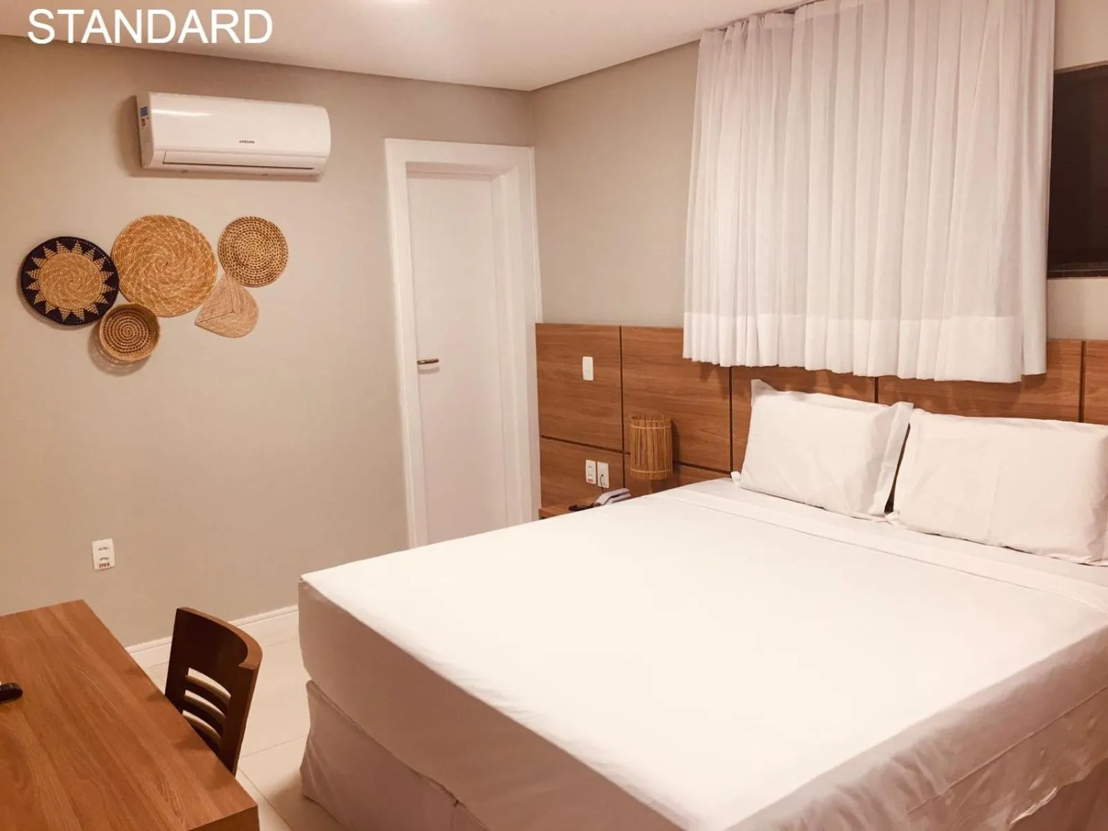 Bed in Paraiso Beach Hotel