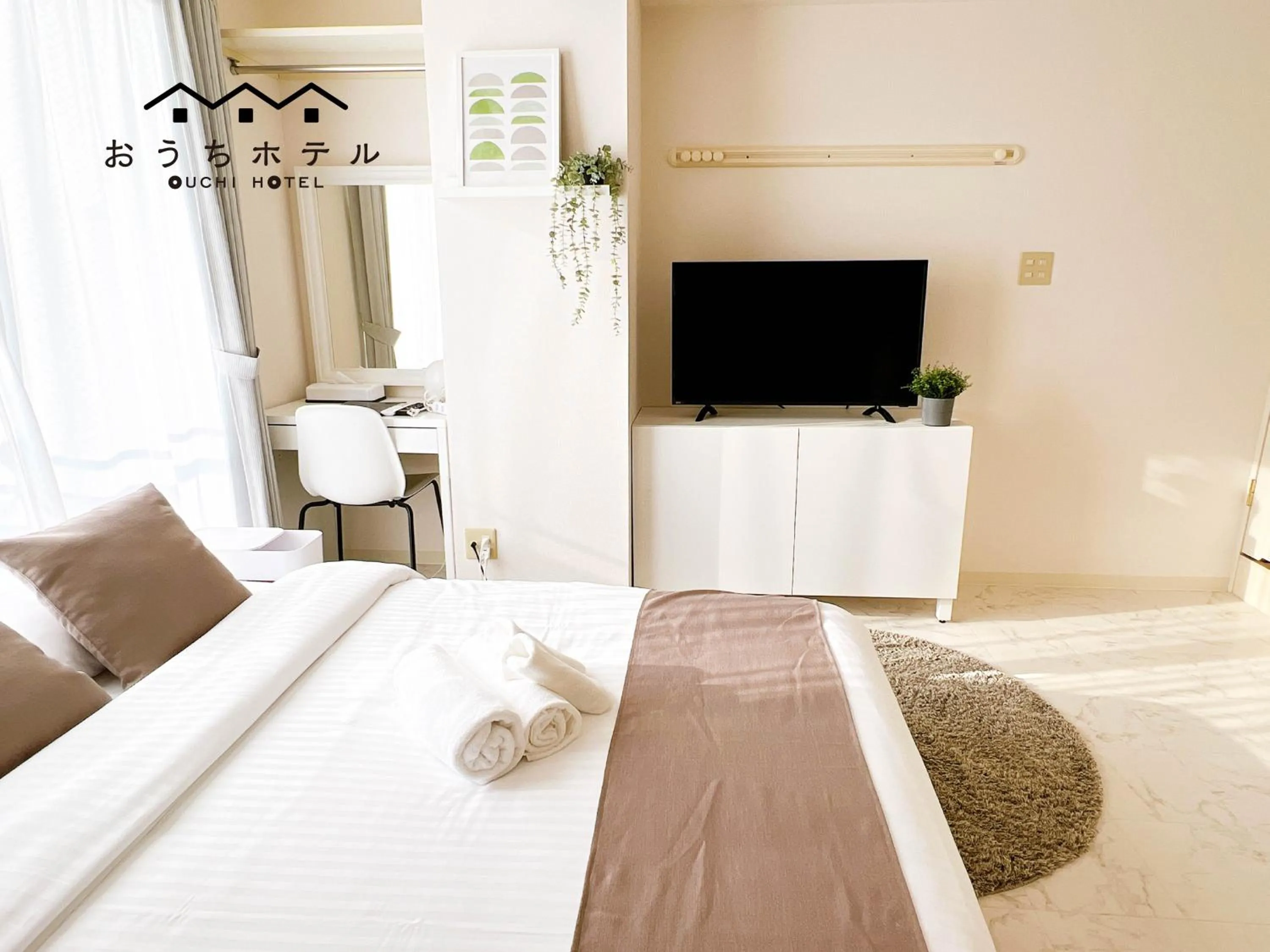 Bed in OUCHI HOTEL Fujimi