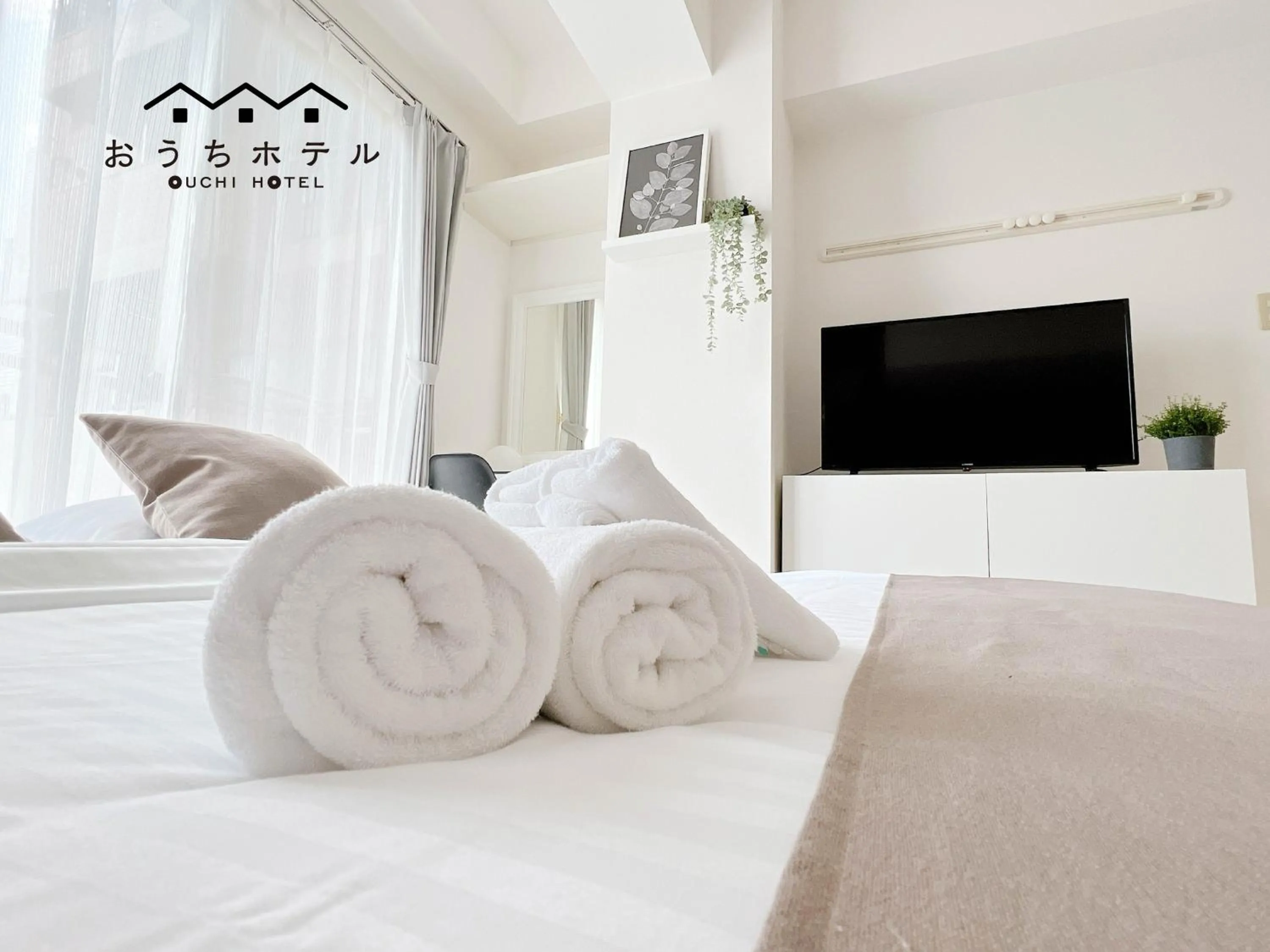 Bed in OUCHI HOTEL Fujimi