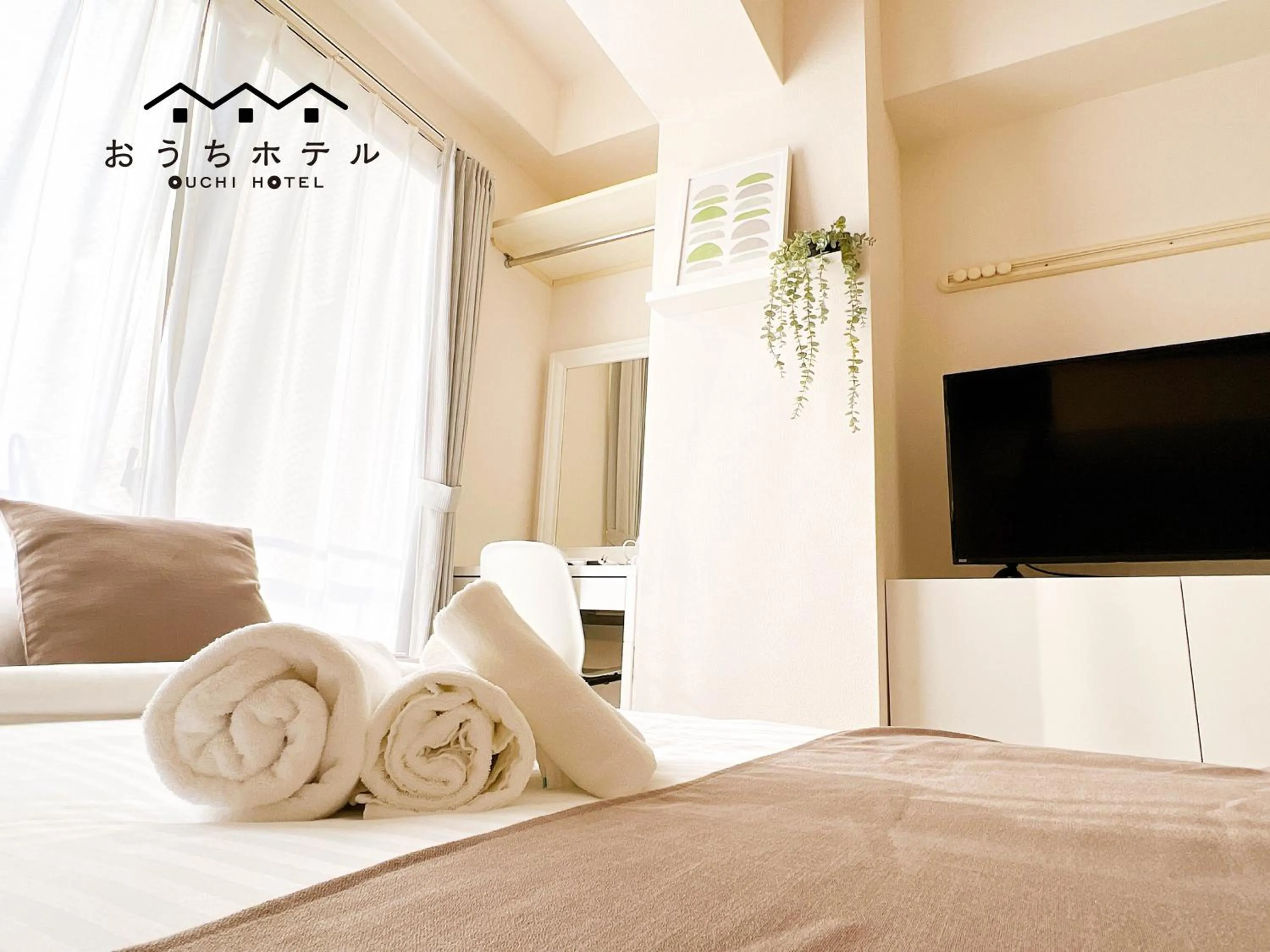 Bed in OUCHI HOTEL Fujimi