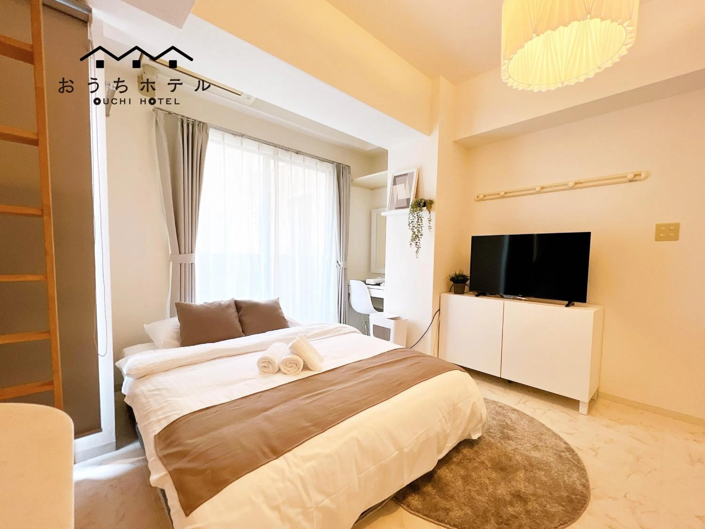 Bed in OUCHI HOTEL Fujimi