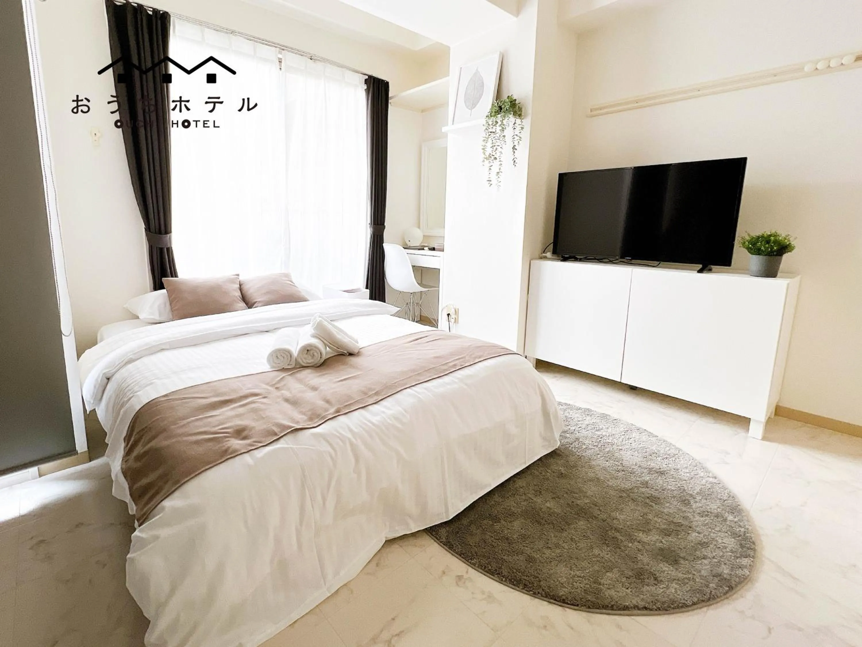 Bed in OUCHI HOTEL Fujimi