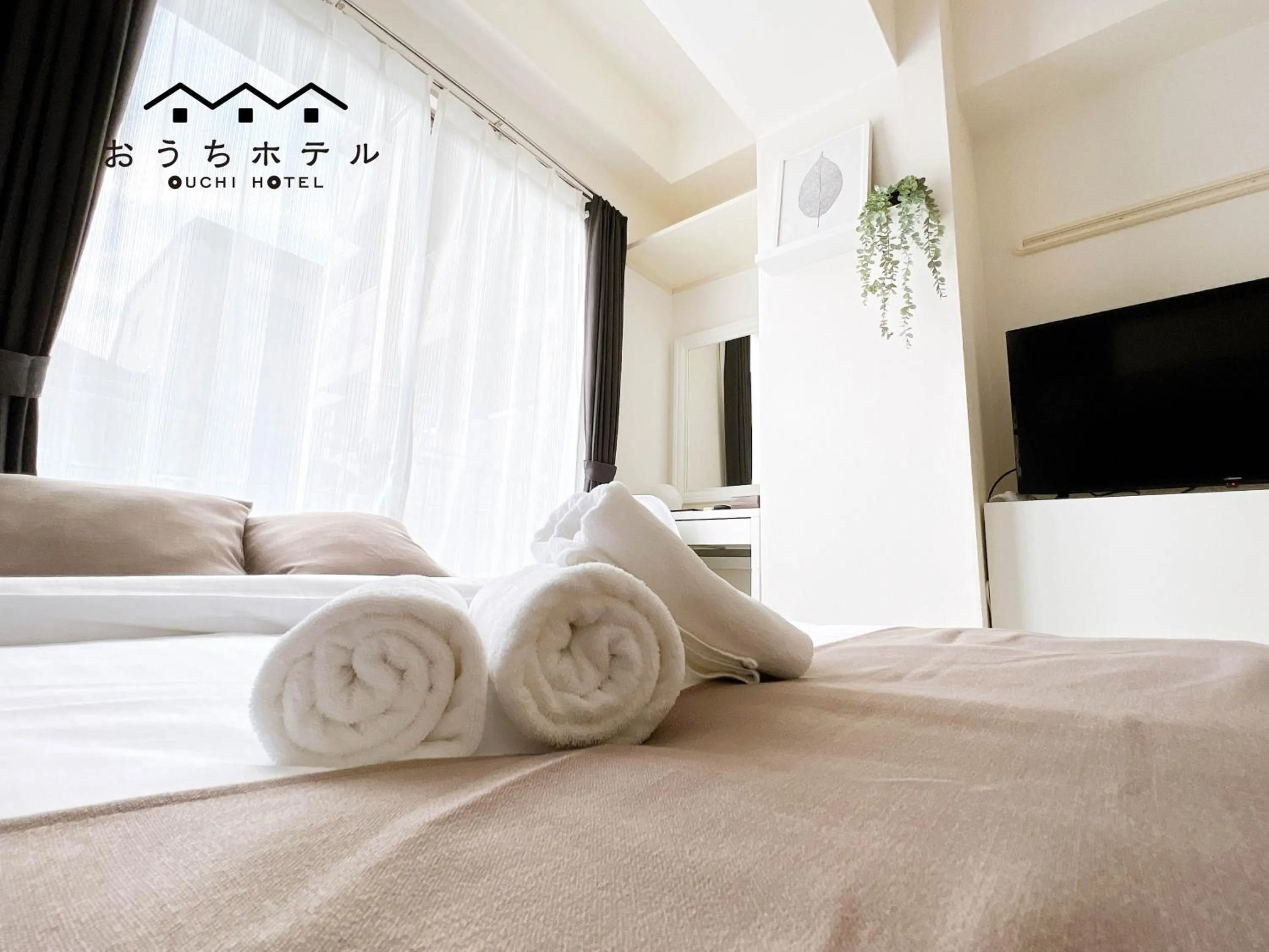 Bed in OUCHI HOTEL Fujimi